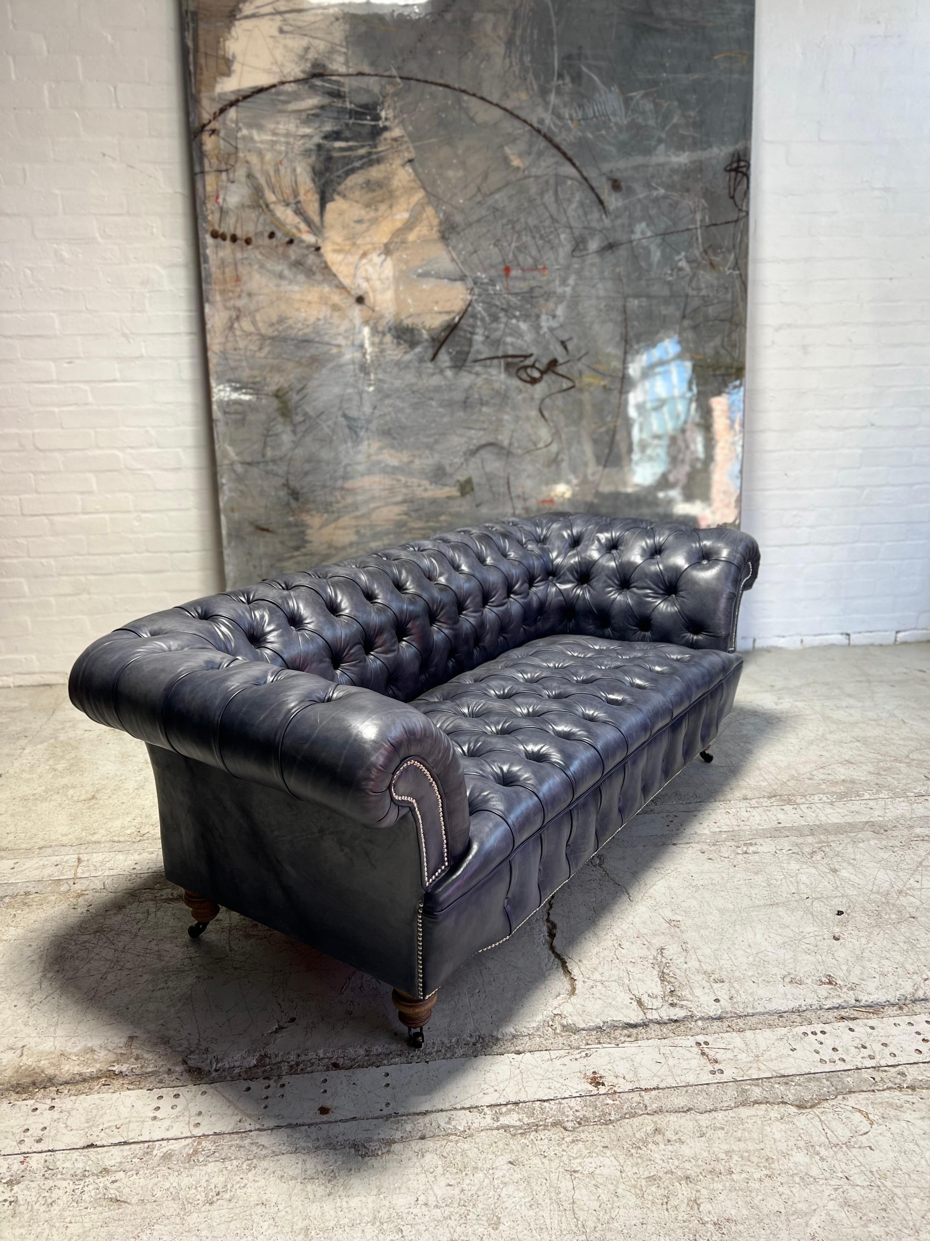 https://a.1stdibscdn.com/our-signature-howard-chesterfield-sofa-in-hand-dyed-elephant-grey-leather-for-sale-picture-8/f_79732/1677225868656/mobilejpegupload_CE48F26CB6D84B16B0CC709B41434197_master.jpg