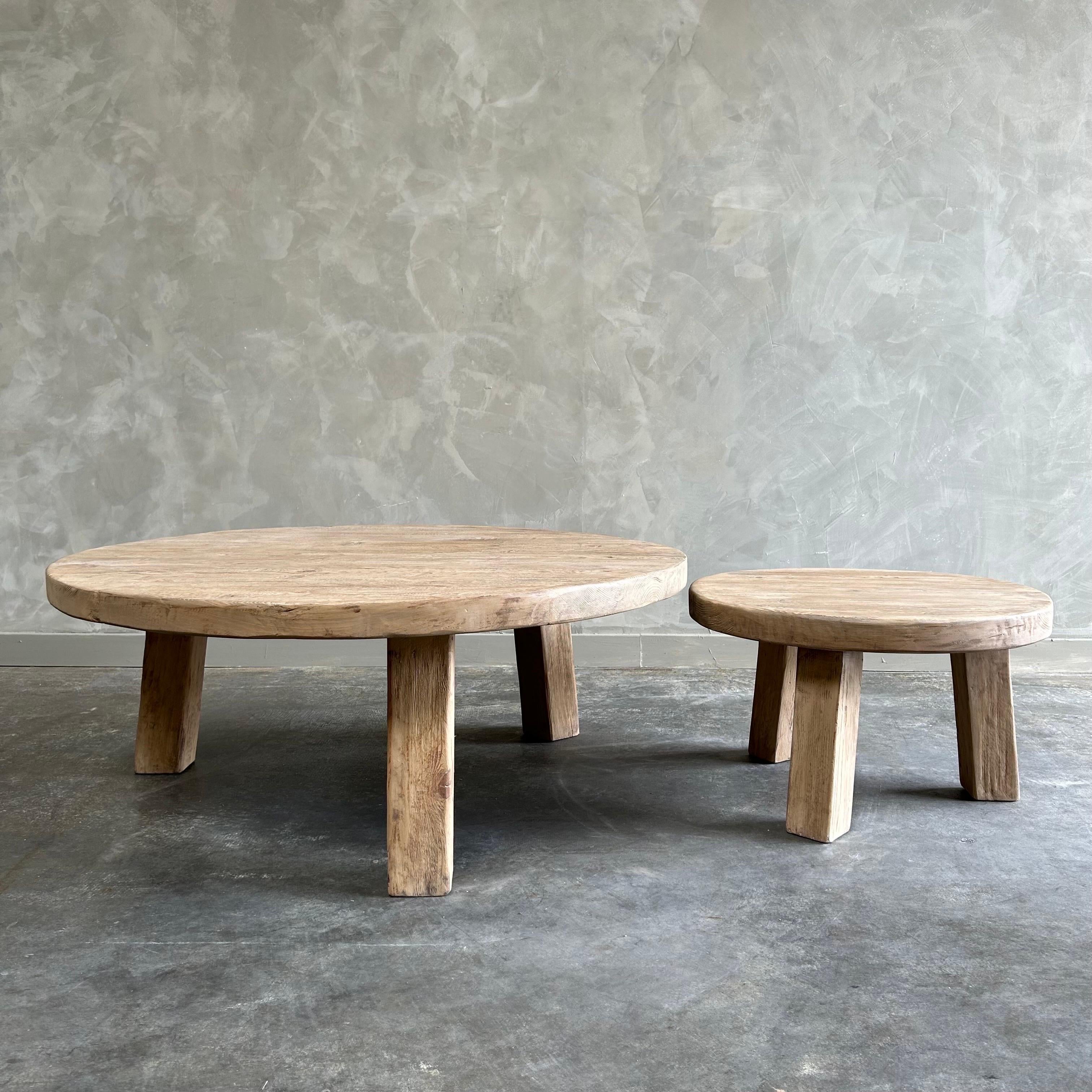 https://a.1stdibscdn.com/solid-round-reclaimed-elm-wood-2-piece-nesting-coffee-table-set-for-sale-picture-4/f_18223/1686799736569/mobilejpegupload_CF7AB90CC1434D11B00F7C8C824BC23E_master.jpg