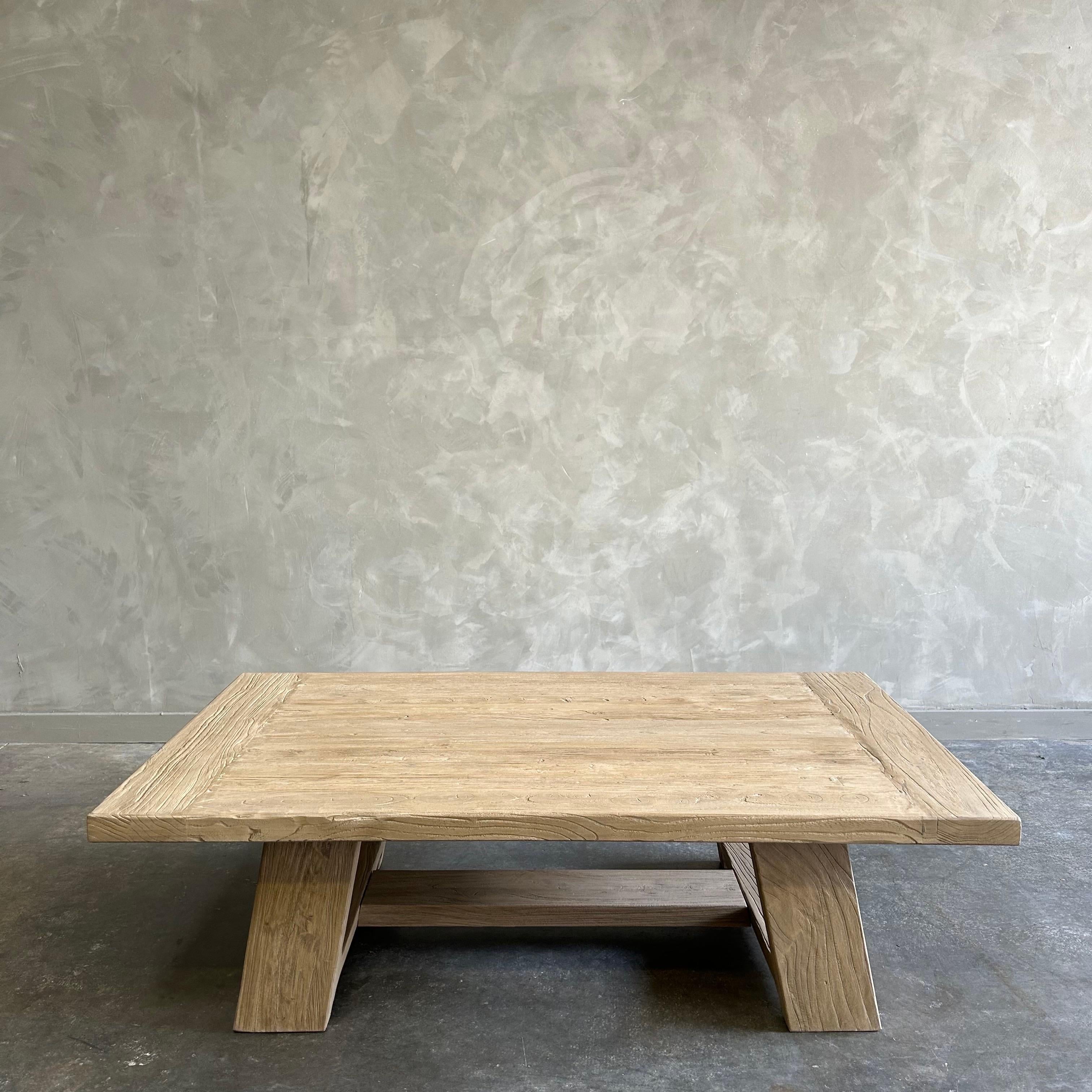 https://a.1stdibscdn.com/reclaimed-elm-wood-coffee-table-for-sale-picture-5/f_18223/f_492966321773945290688/mobilejpegupload_D47275FBCE4343BE8BE32405D3DCAE8E_master.jpg