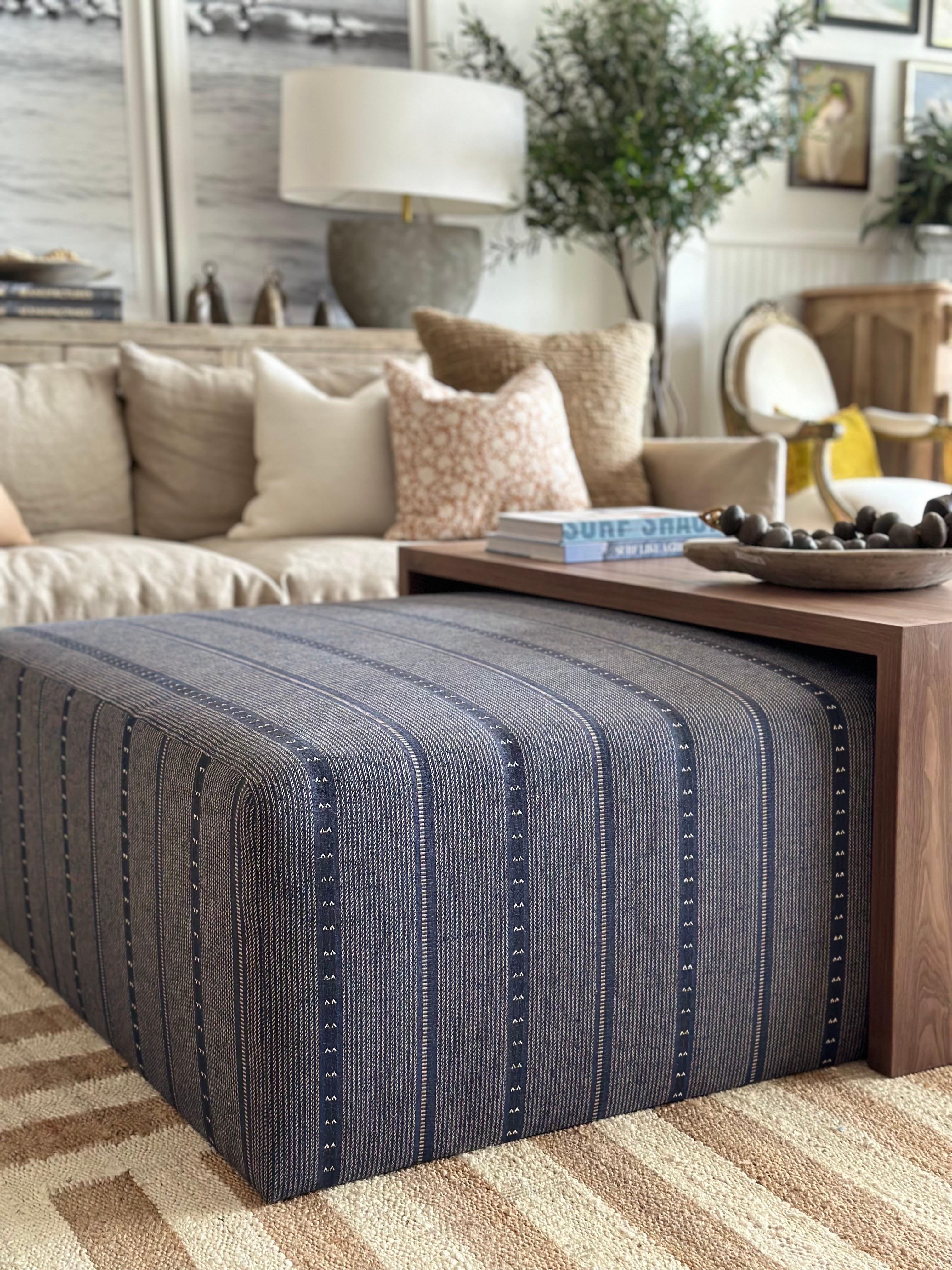 https://a.1stdibscdn.com/custom-made-wool-and-jute-cube-ottoman-with-walnut-waterfall-style-table-for-sale-picture-2/f_18223/1685397092066/mobilejpegupload_D5EF932808D649F281365C047A486A7E_master.jpg