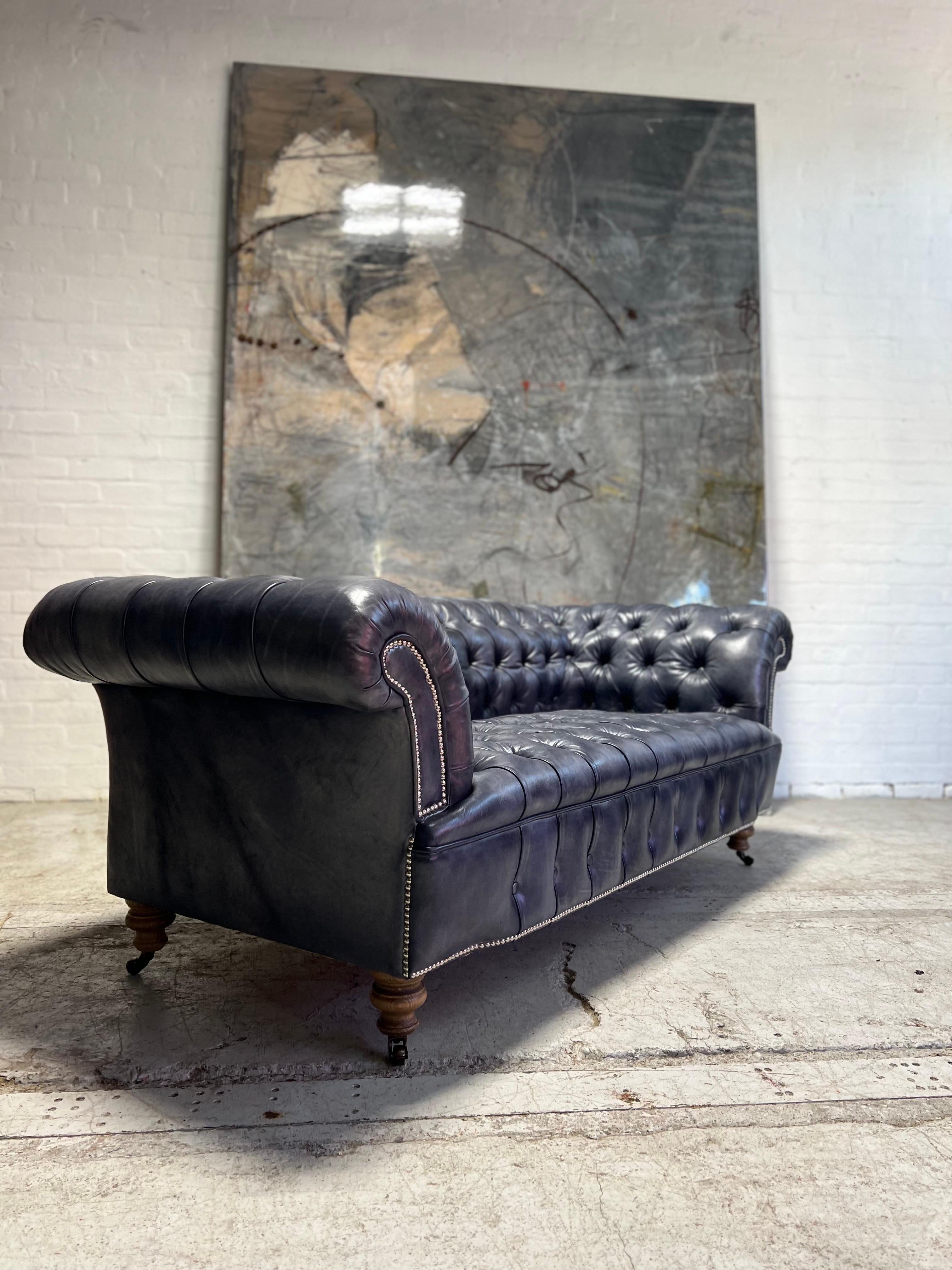 https://a.1stdibscdn.com/our-signature-howard-chesterfield-sofa-in-hand-dyed-elephant-grey-leather-for-sale-picture-7/f_79732/1677225866249/mobilejpegupload_DD02BCF5C6F04F9E82C178FEFBB2EDB2_master.jpg