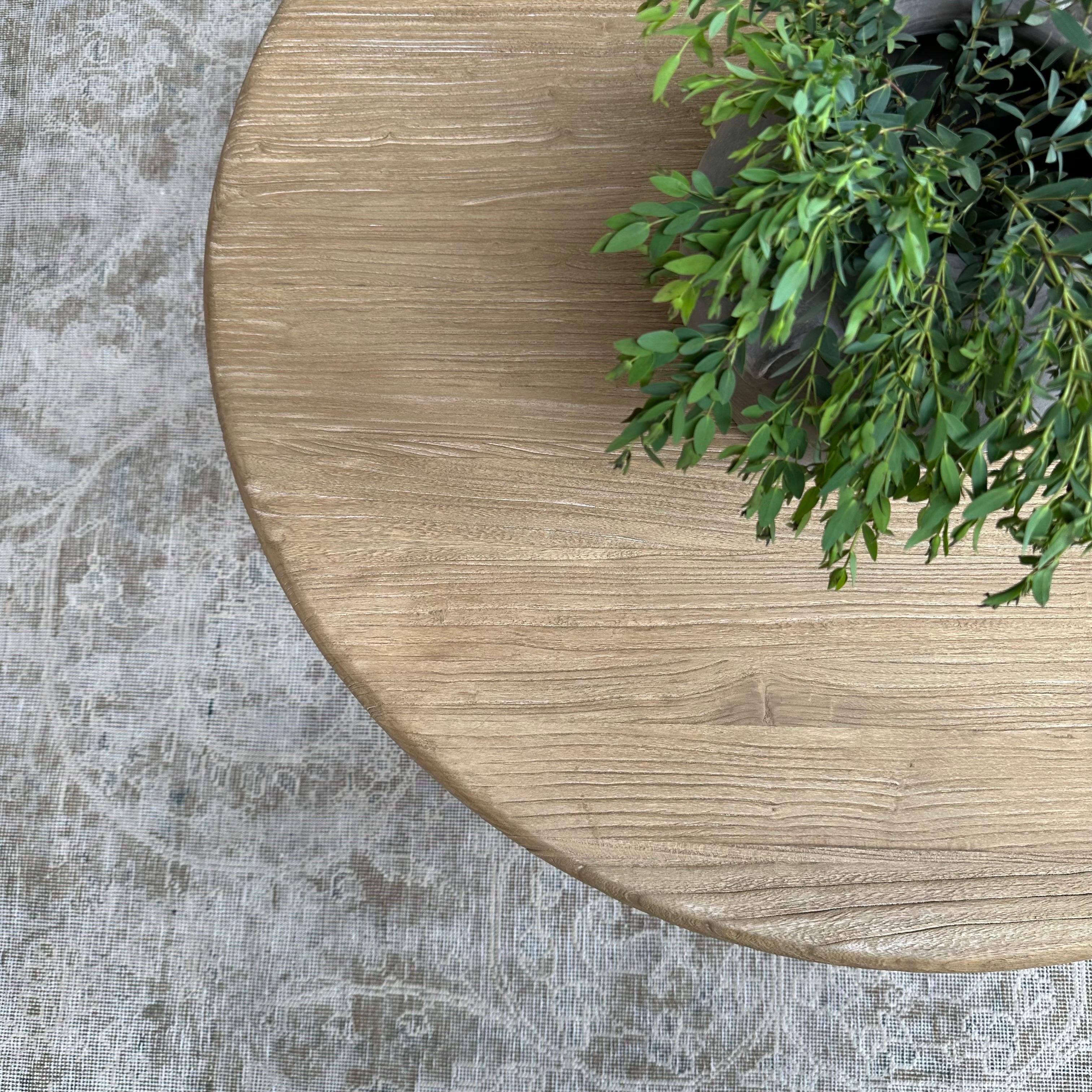 https://a.1stdibscdn.com/custom-reclaimed-elm-wood-round-coffee-table-for-sale-picture-10/f_18223/1686240744013/mobilejpegupload_E2CEC63251E04AF6A71B7F021DFFE5A1_master.jpg