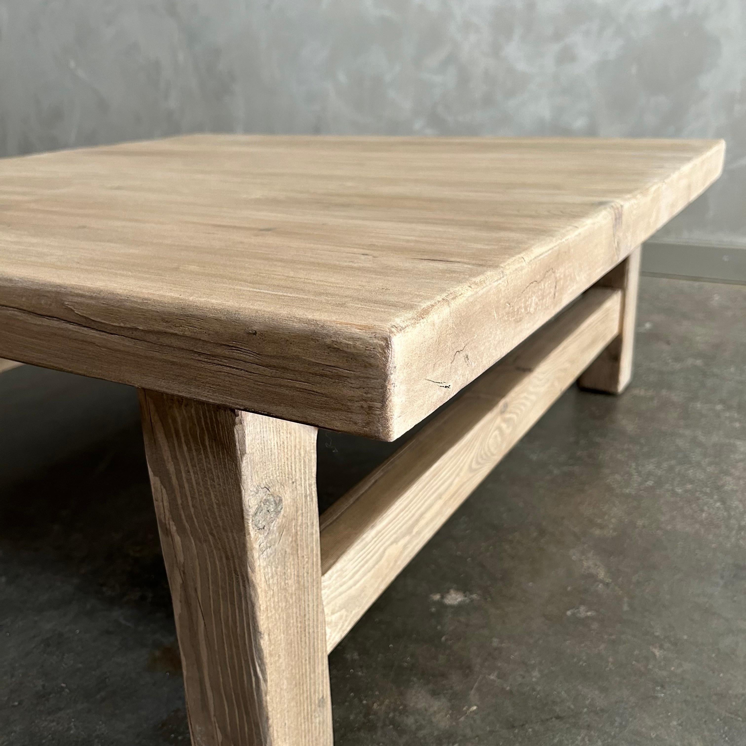https://a.1stdibscdn.com/custom-made-reclaimed-elm-wood-square-coffee-table-for-sale-picture-5/f_18223/f_468873321759347998216/mobilejpegupload_F7D124B2ADA940E0AE2446D3CC82ABA6_master.jpg
