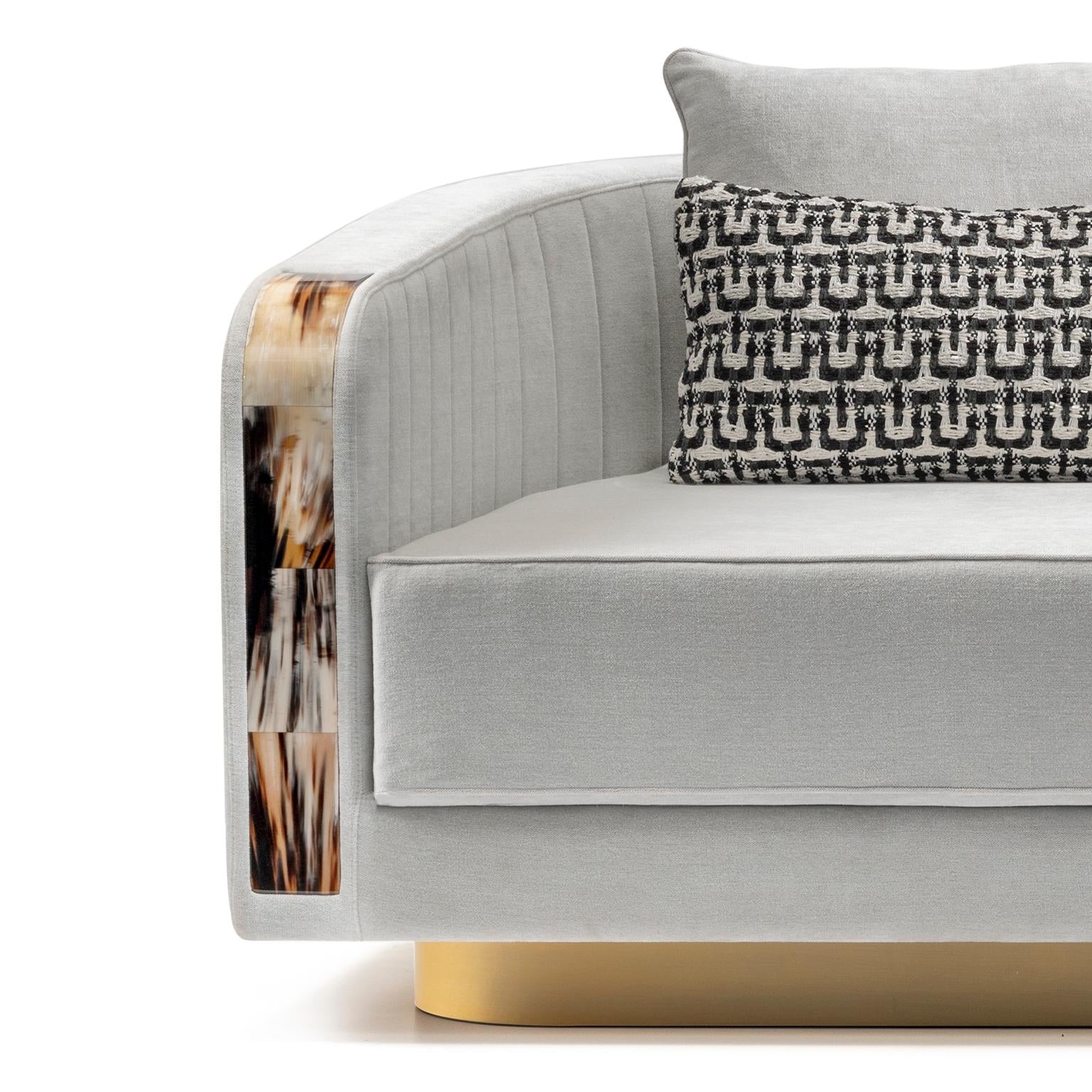 https://a.1stdibscdn.com/afrodite-sofa-upholstered-in-belsuede-fabric-with-armrests-in-horn-mod-7040b-for-sale-picture-2/f_50102/f_175241611578643010391/mod_7040_dt_master.jpg