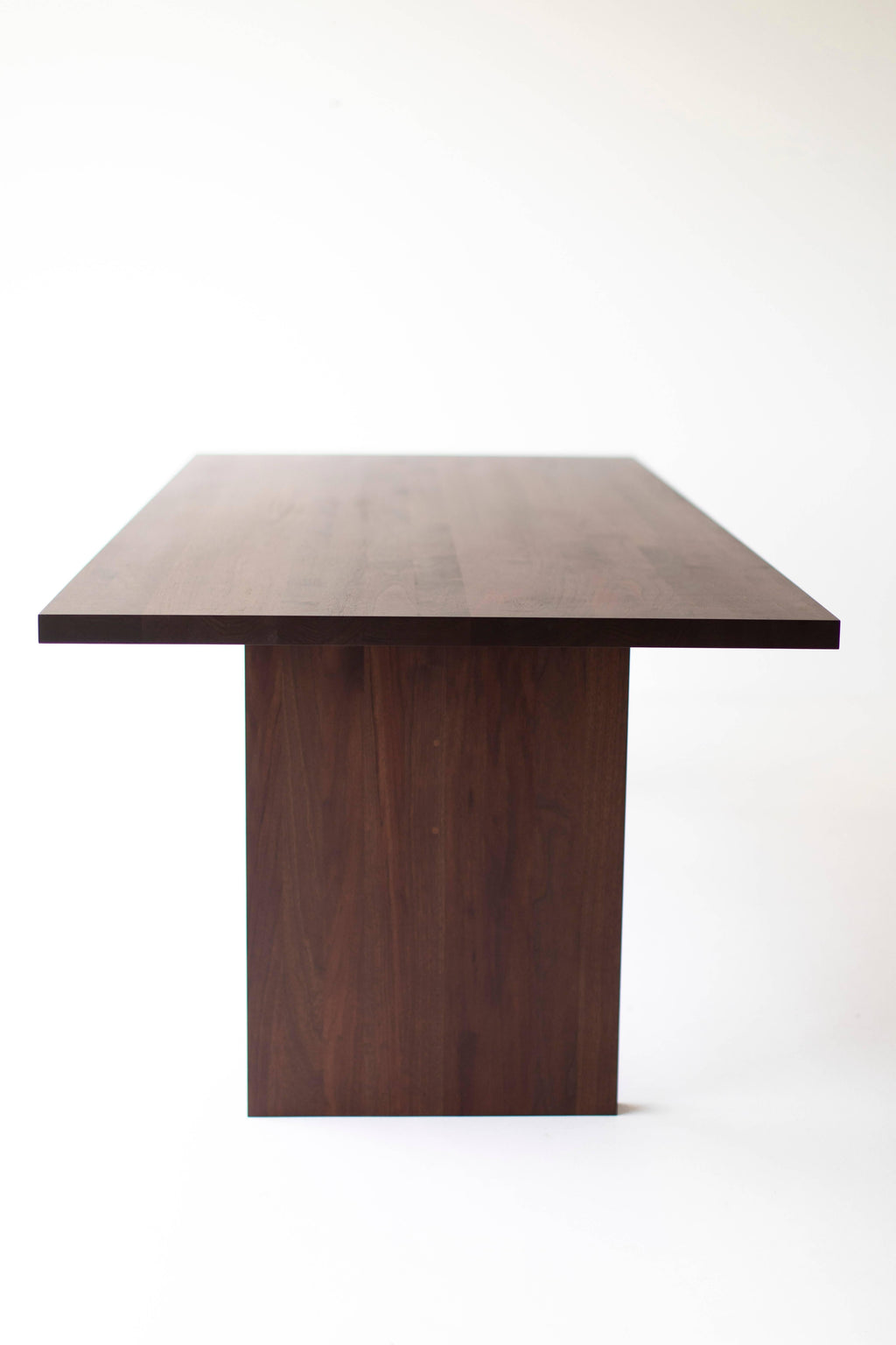 https://a.1stdibscdn.com/modern-walnut-dining-table-the-toyko-table-for-sale-picture-6/f_9720/1529434163547/modern_walnut_dining_table_06_master.jpg