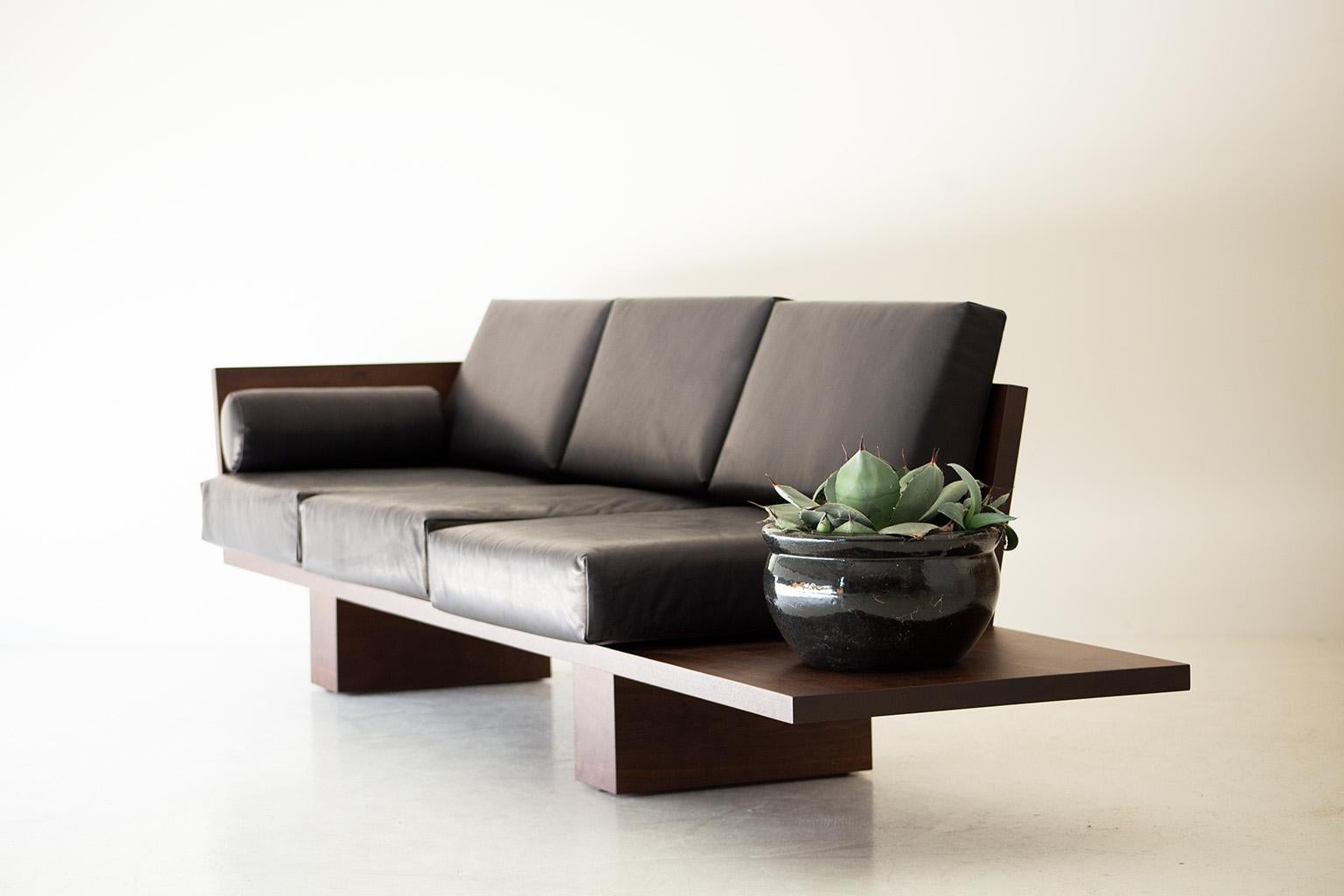 https://a.1stdibscdn.com/modern-walnut-leather-sofa-the-suelo-for-sale-picture-3/f_9720/f_287285421652977807198/modern_walnut_leather_sofa_suelo_03_master.jpg