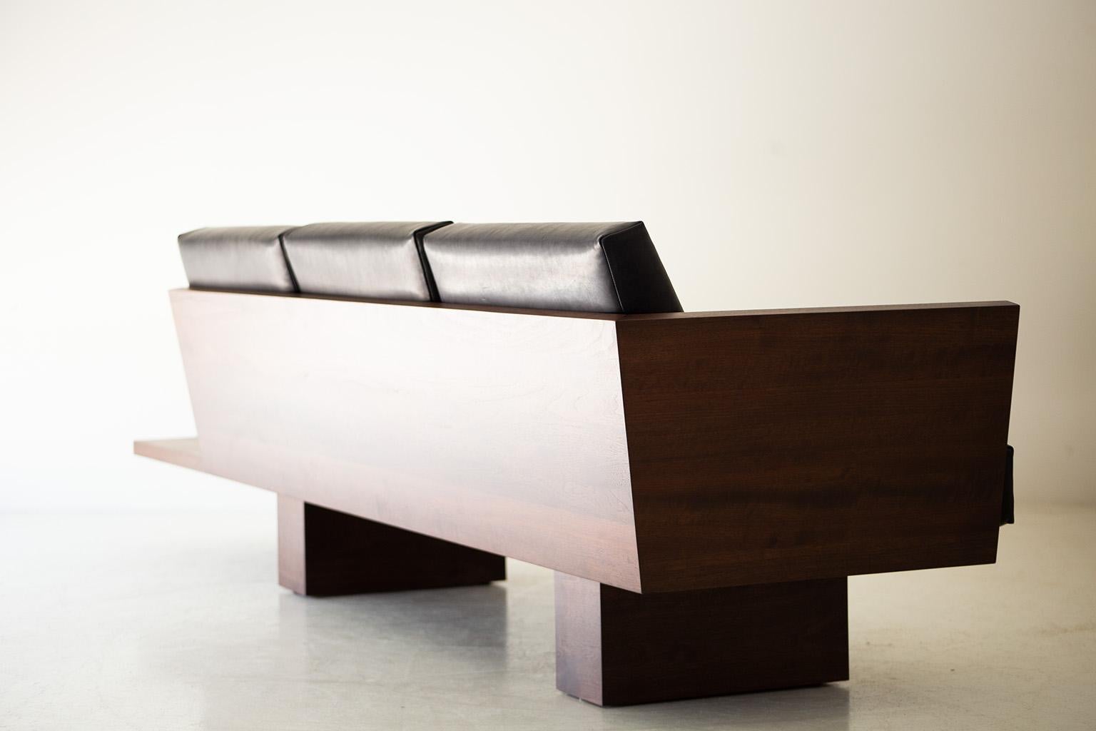 https://a.1stdibscdn.com/modern-walnut-leather-sofa-the-suelo-for-sale-picture-4/f_9720/f_287285421652977807171/modern_walnut_leather_sofa_suelo_04_master.jpg