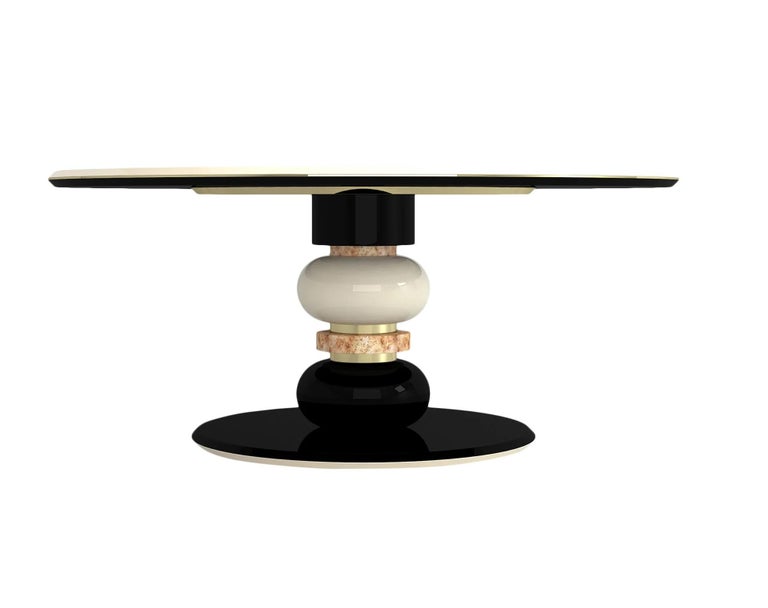 https://a.1stdibscdn.com/contemporary-dining-table-in-cream-and-black-lacquer-for-sale-picture-5/f_27693/f_294130321656910426966/muranti1_master.jpg?width=768