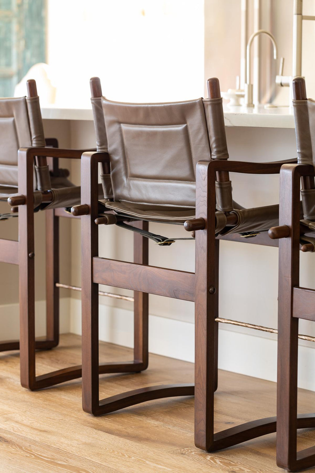 https://a.1stdibscdn.com/campaign-safari-counter-stool-with-brown-or-black-leather-upholstery-for-sale-picture-4/f_54442/f_209790221645730851473/mw_ha_bar2_v1_webres_master.jpg