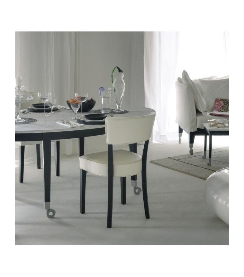 https://a.1stdibscdn.com/neoneoz-chair-in-natural-ash-by-philippe-starck-for-driade-for-sale-picture-6/f_16392/f_470698621760623456108/neoz_driade_sedia_master.jpg