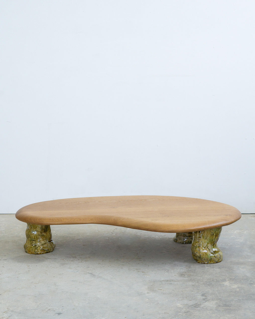 https://a.1stdibscdn.com/sculptural-coffee-table-white-oak-glazed-ceramic-for-sale-picture-7/f_90922/f_485405821769544143985/oak_ceramic_coffee_table_knysch_04_master.jpg