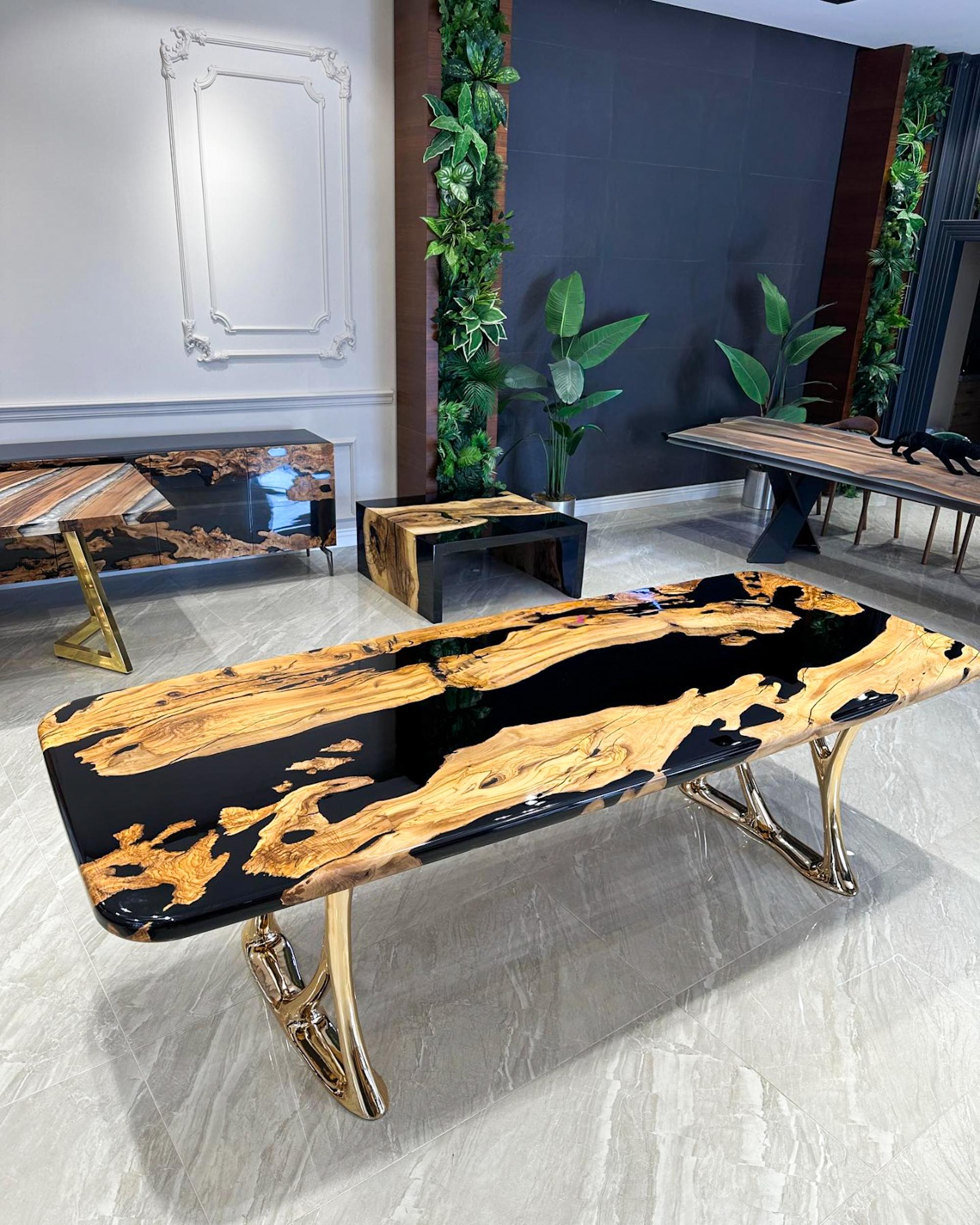 https://a.1stdibscdn.com/custom-live-edge-olive-wood-crystal-clear-epoxy-resin-dining-table-for-sale-picture-5/f_91932/f_495753821775653107863/olive_wood_epoxy_table_1_master.jpg