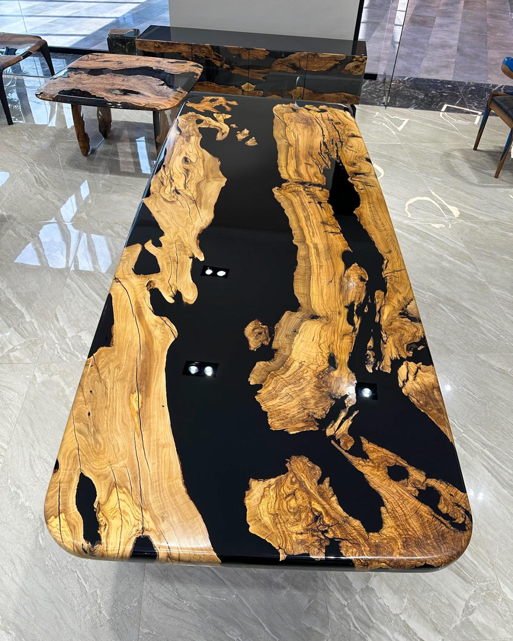 https://a.1stdibscdn.com/custom-live-edge-olive-wood-crystal-clear-epoxy-resin-dining-table-for-sale-picture-2/f_91932/f_495753821775653107881/olive_wood_epoxy_table_2_master.jpg