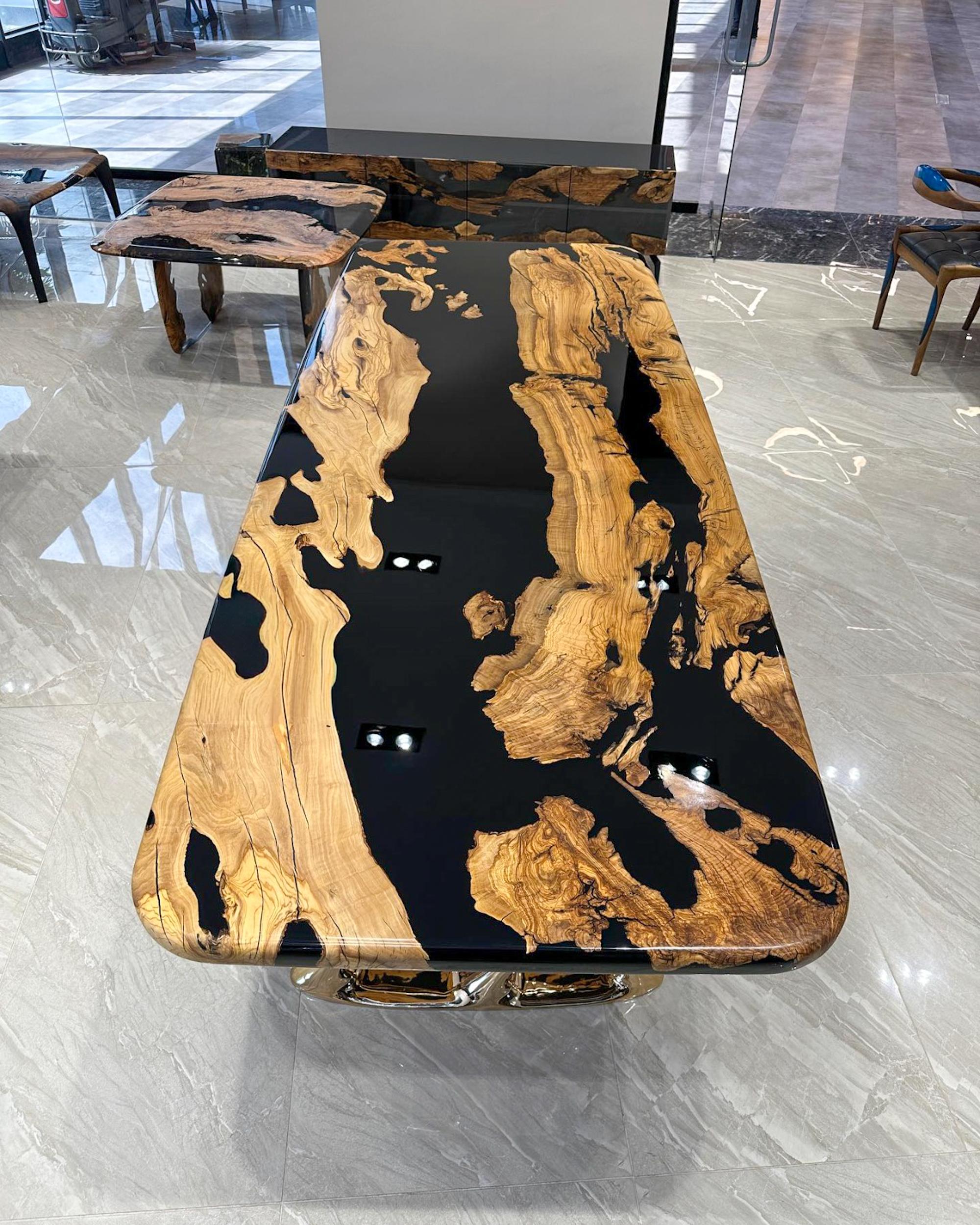 https://a.1stdibscdn.com/custom-live-edge-olive-wood-crystal-clear-epoxy-resin-dining-table-for-sale-picture-6/f_91932/f_495753821775653107937/olive_wood_epoxy_table_5_master.jpg