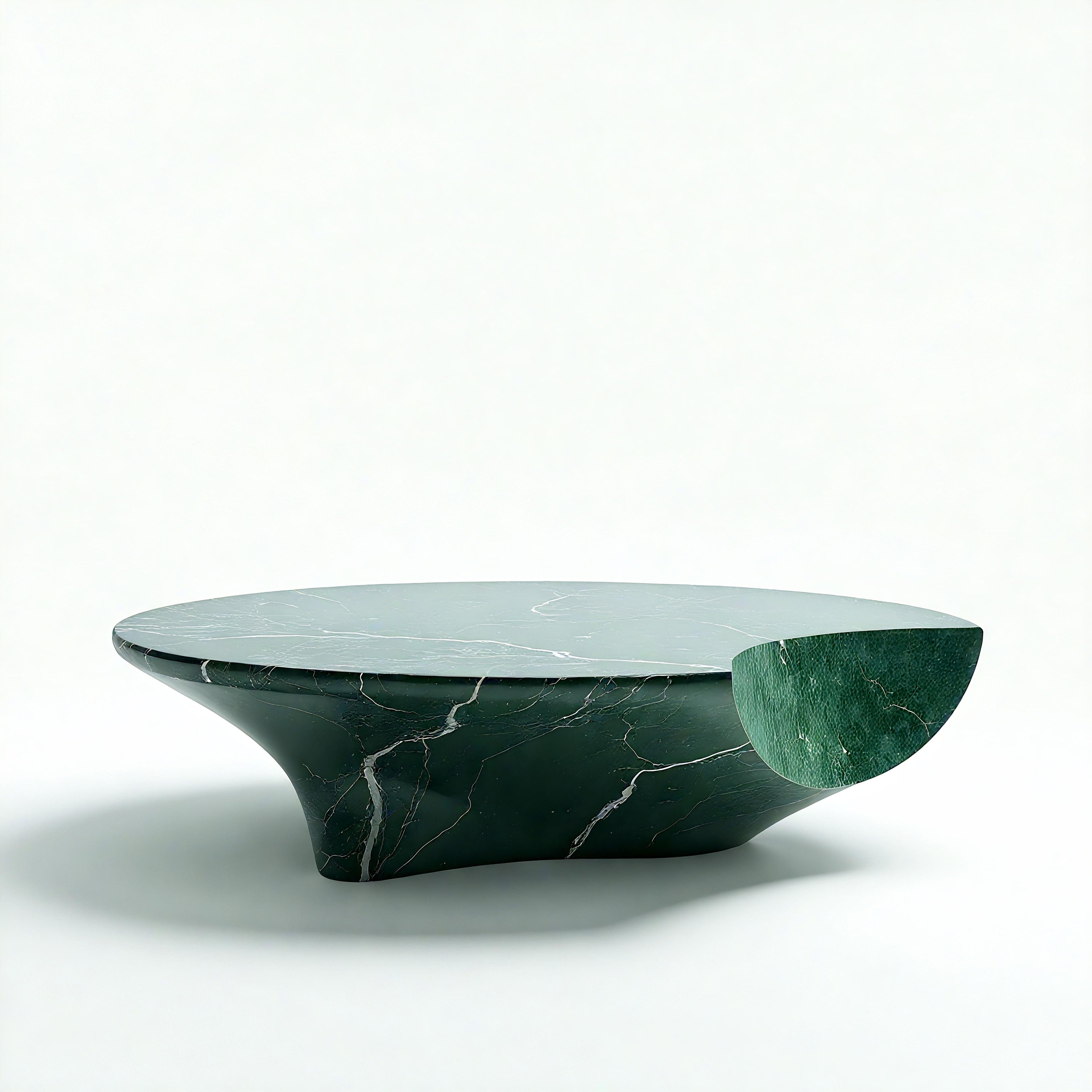 https://a.1stdibscdn.com/milo-sculptural-green-marble-coffee-table-with-asymmetrical-crescent-accent-for-sale-picture-2/f_97222/f_459177921752781136740/openart_52ab17b45db0472fbc2a60070d81efbf_raw_master.jpg
