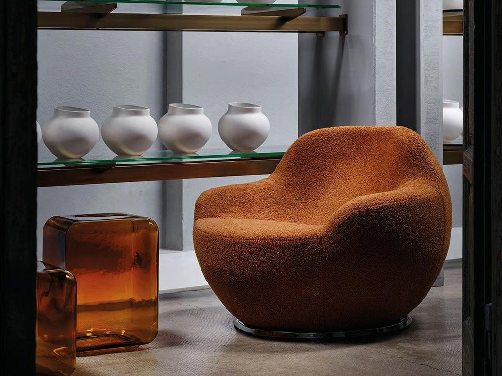 https://a.1stdibscdn.com/acerbis-palla-armchair-by-philippe-malouin-for-sale-picture-7/f_16392/f_452413721748940288701/palla_armchair_acerbis_living_room_master.jpg
