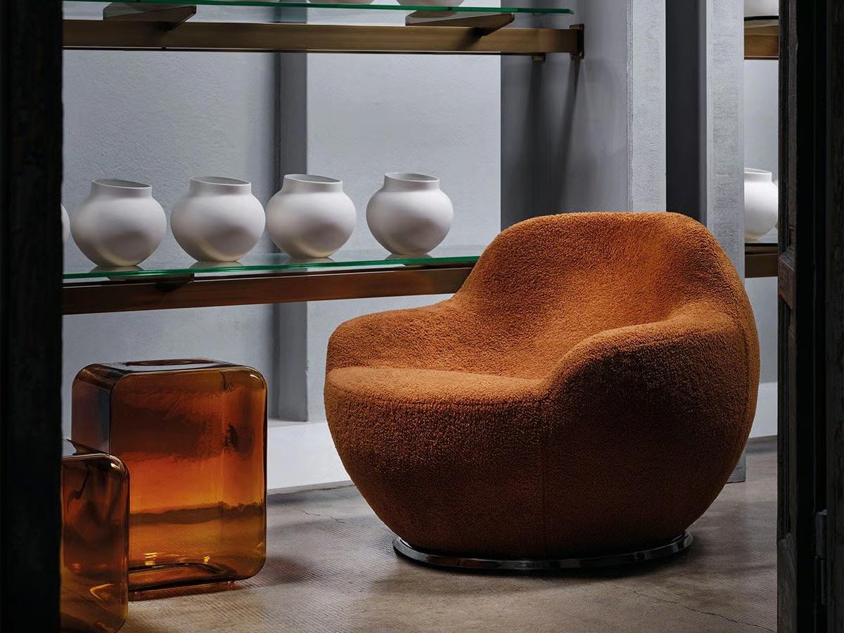 https://a.1stdibscdn.com/acerbis-palla-armchair-by-philippe-malouin-for-sale-picture-7/f_16392/f_452413721748940288701/palla_armchair_acerbis_living_room_master.jpg