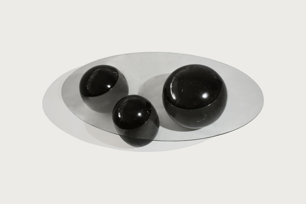 https://a.1stdibscdn.com/ovni-uovo-black-marble-glass-sculptural-coffee-table-for-sale-picture-8/f_69682/f_461040921754066540467/panorammma_OvniUovoCoffeeTable_1__master.jpg
