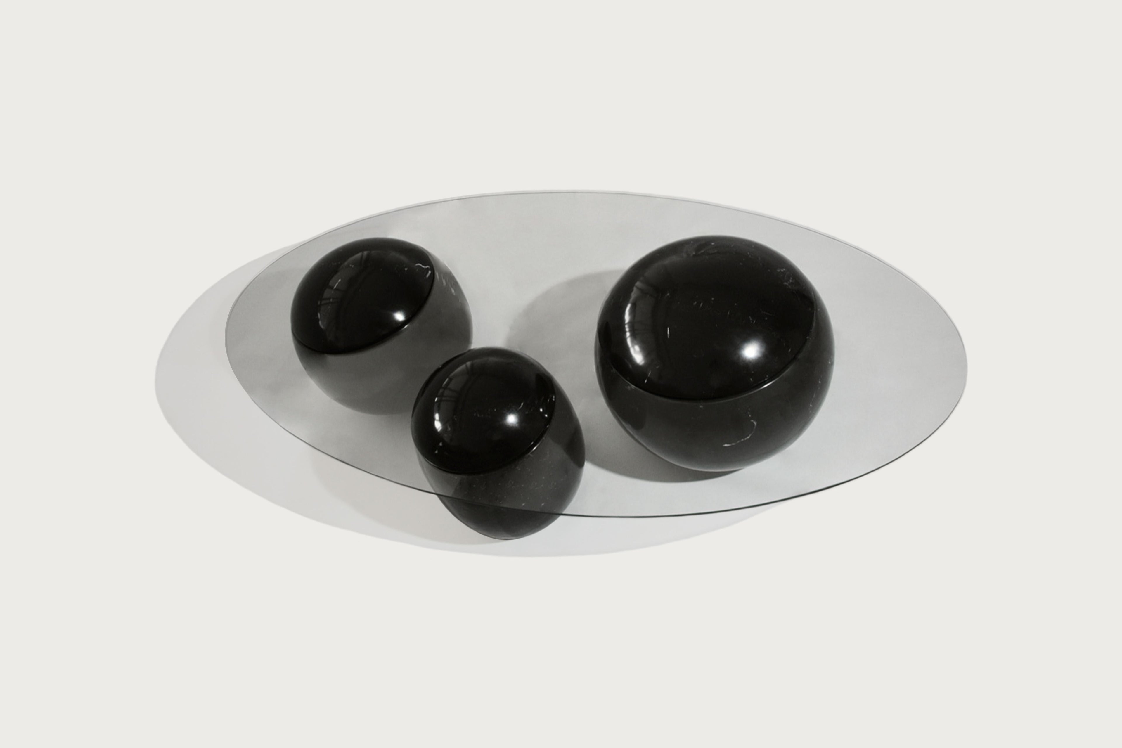 https://a.1stdibscdn.com/ovni-uovo-black-marble-glass-sculptural-coffee-table-for-sale-picture-8/f_69682/f_461040921754066540467/panorammma_OvniUovoCoffeeTable_1__master.jpg