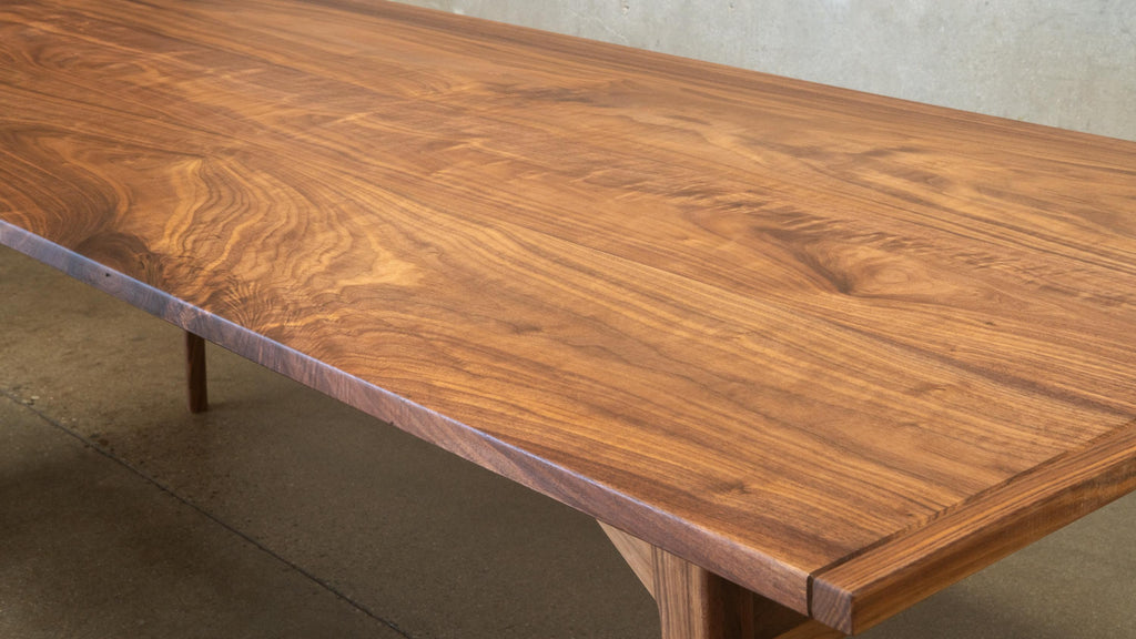 https://a.1stdibscdn.com/charis-mid-century-modern-styled-solid-walnut-dining-table-minimalist-for-sale-picture-8/f_86132/f_341378421771443786235/petechairs26_03788_master.jpg
