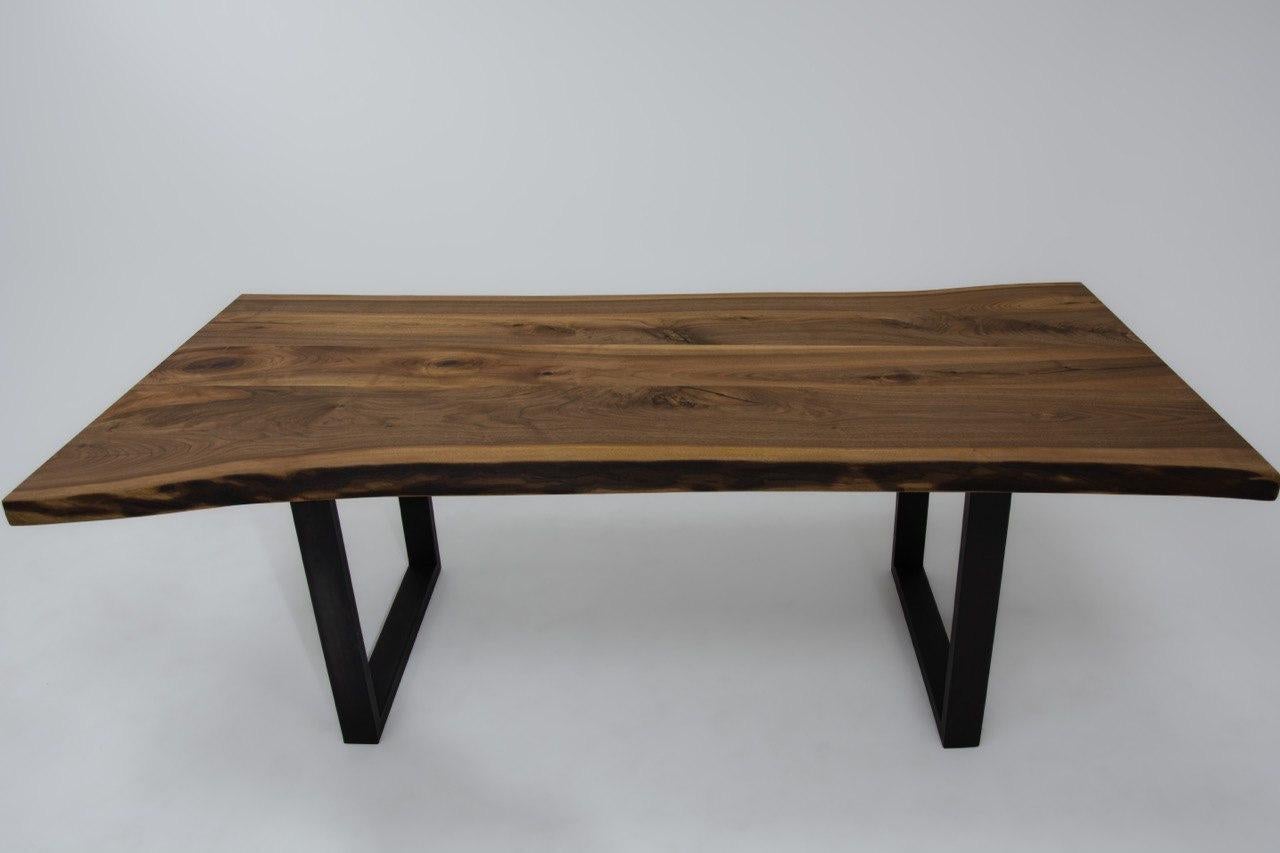 https://a.1stdibscdn.com/live-edge-solid-walnut-wood-dining-table-for-sale-picture-4/f_91932/f_363621621695893921435/photo_5861771112633975207_y_master.jpg