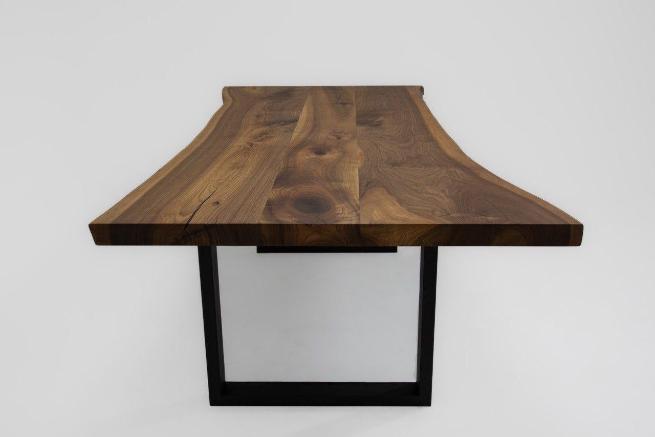 https://a.1stdibscdn.com/live-edge-solid-walnut-wood-dining-table-for-sale-picture-6/f_91932/f_363621621695893921388/photo_5861771112633975208_y_master.jpg