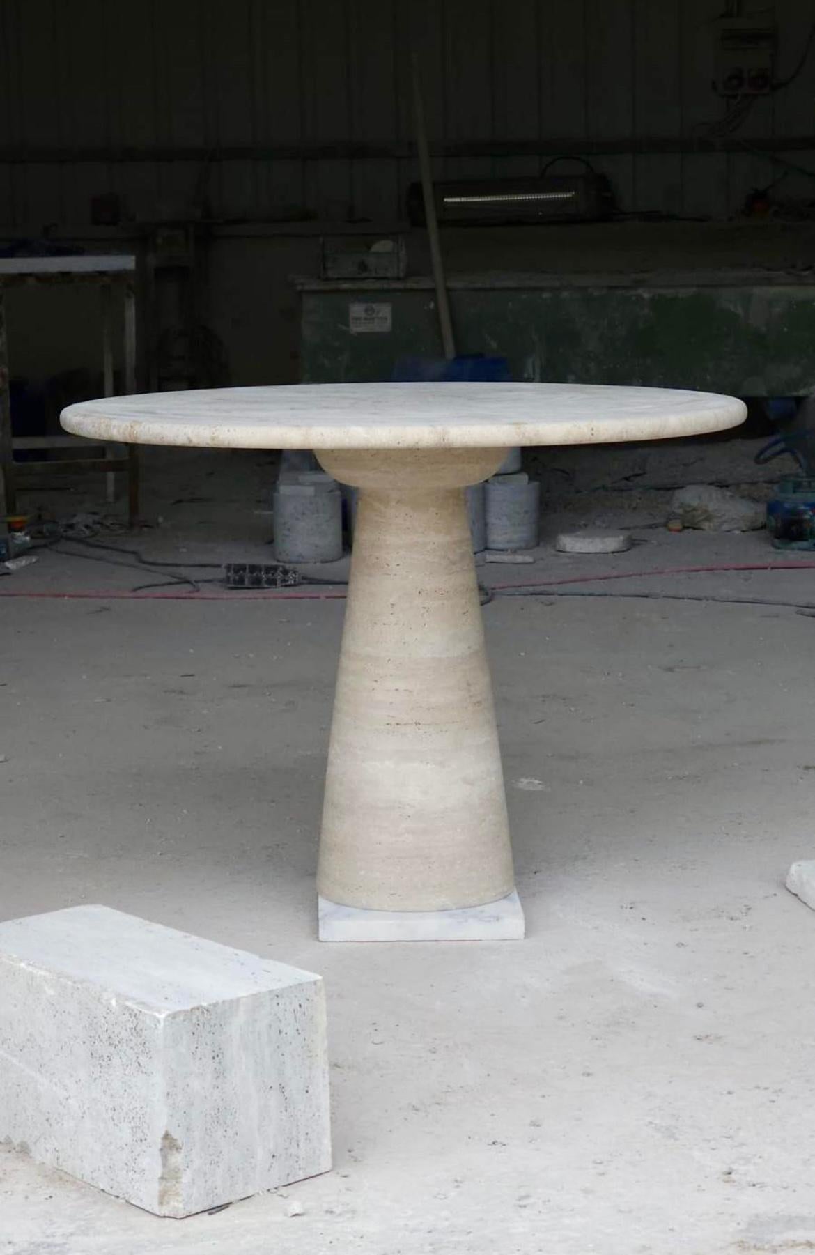 https://a.1stdibscdn.com/cream-travertine-round-dining-table-in-the-style-of-1970-angelo-mangiarotti-for-sale-picture-3/f_80522/f_491511521773354121769/photo_bespoke_romanekdesignstudio_1__master.jpg