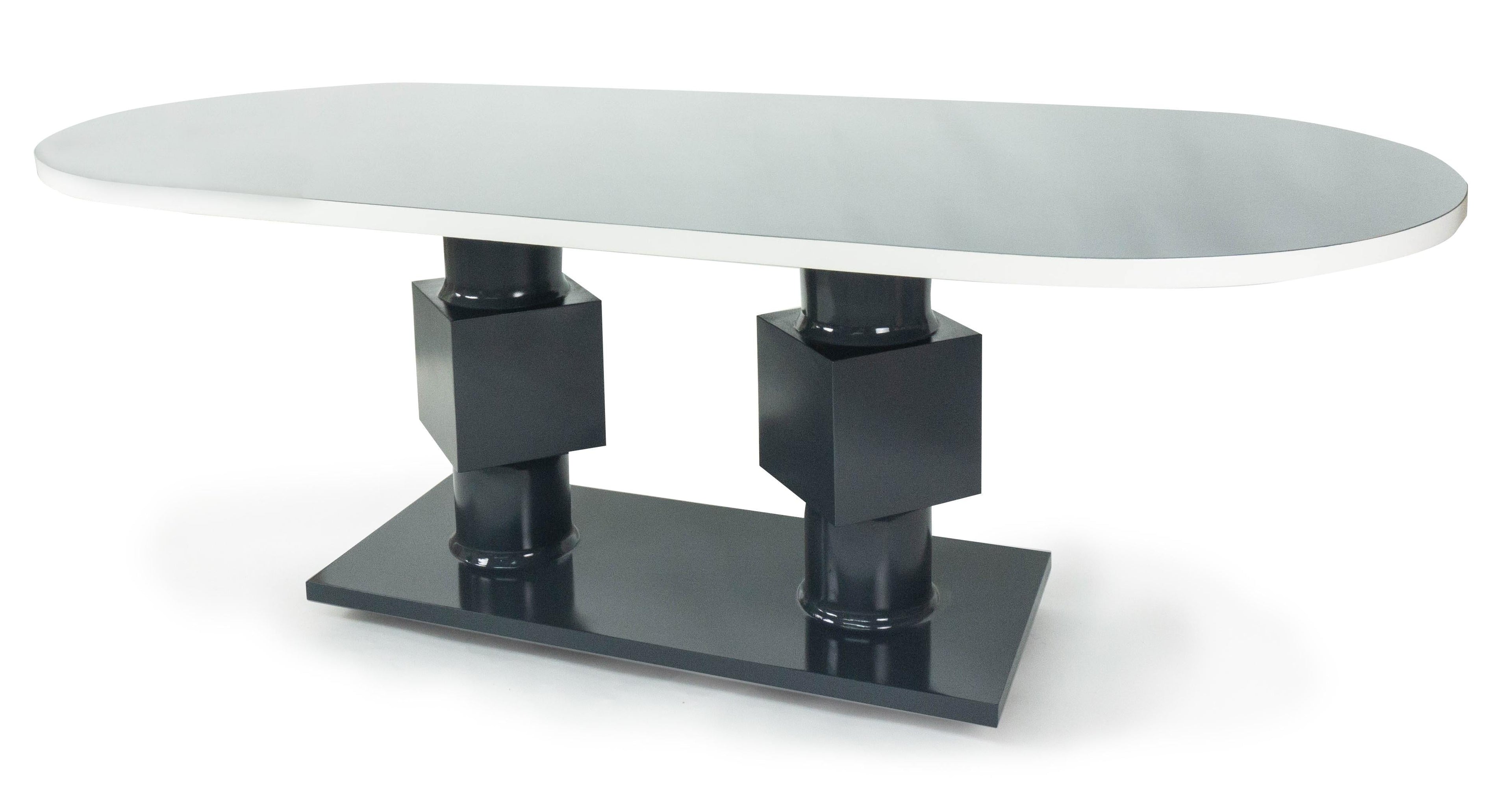https://a.1stdibscdn.com/oval-dining-table-with-double-pedestal-base-for-sale-picture-3/f_21233/1535487259226/roundsquares_angle2_master.jpg