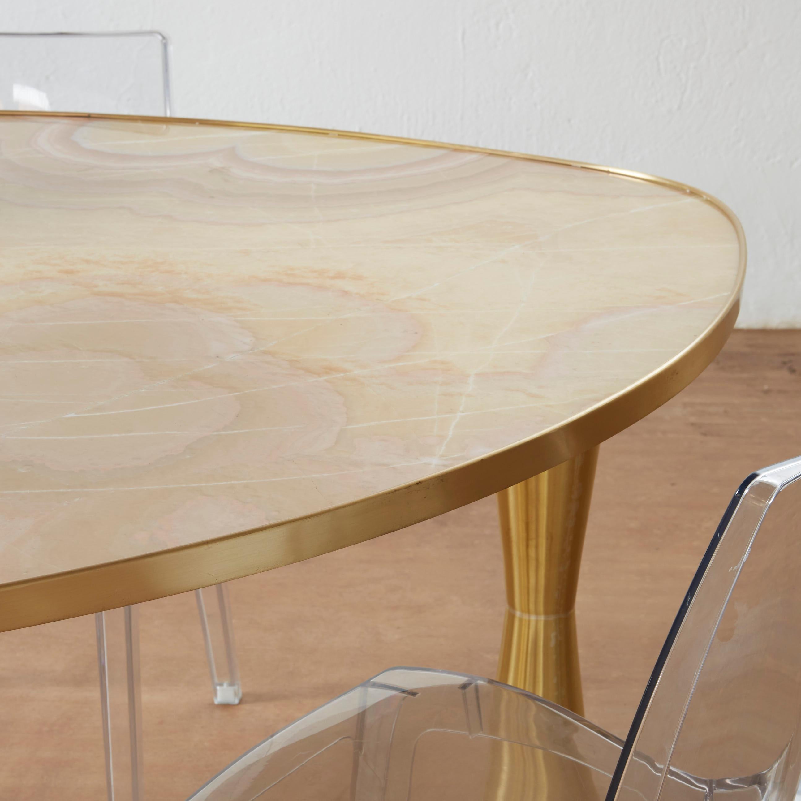 https://a.1stdibscdn.com/onyx-and-brass-satellite-dining-table-by-atelier-terrai-for-sale-picture-5/f_12192/f_444601221744312854964/rt_11511_master.jpg
