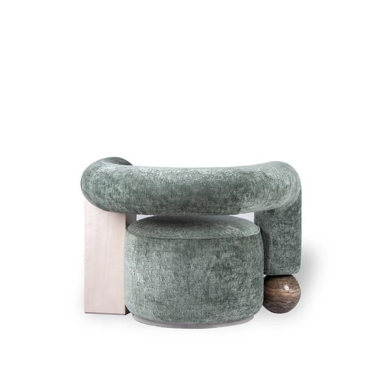 https://a.1stdibscdn.com/eternis-accent-chair-for-sale-picture-2/f_103682/f_450155321747200189384/sculptural_green_armchair_view_3_master.jpg
