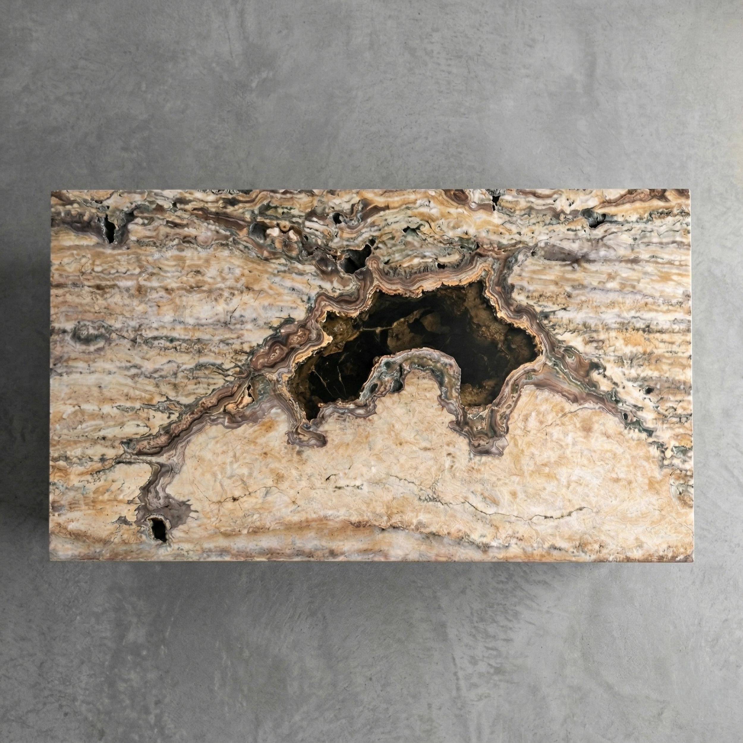 https://a.1stdibscdn.com/pitted-silver-travertine-coffee-table-unfilled-silver-travertine-center-table-for-sale-picture-6/f_91932/f_494881721775123791380/silver_traverten_coffee_table_6_2_jpg_master.jpeg