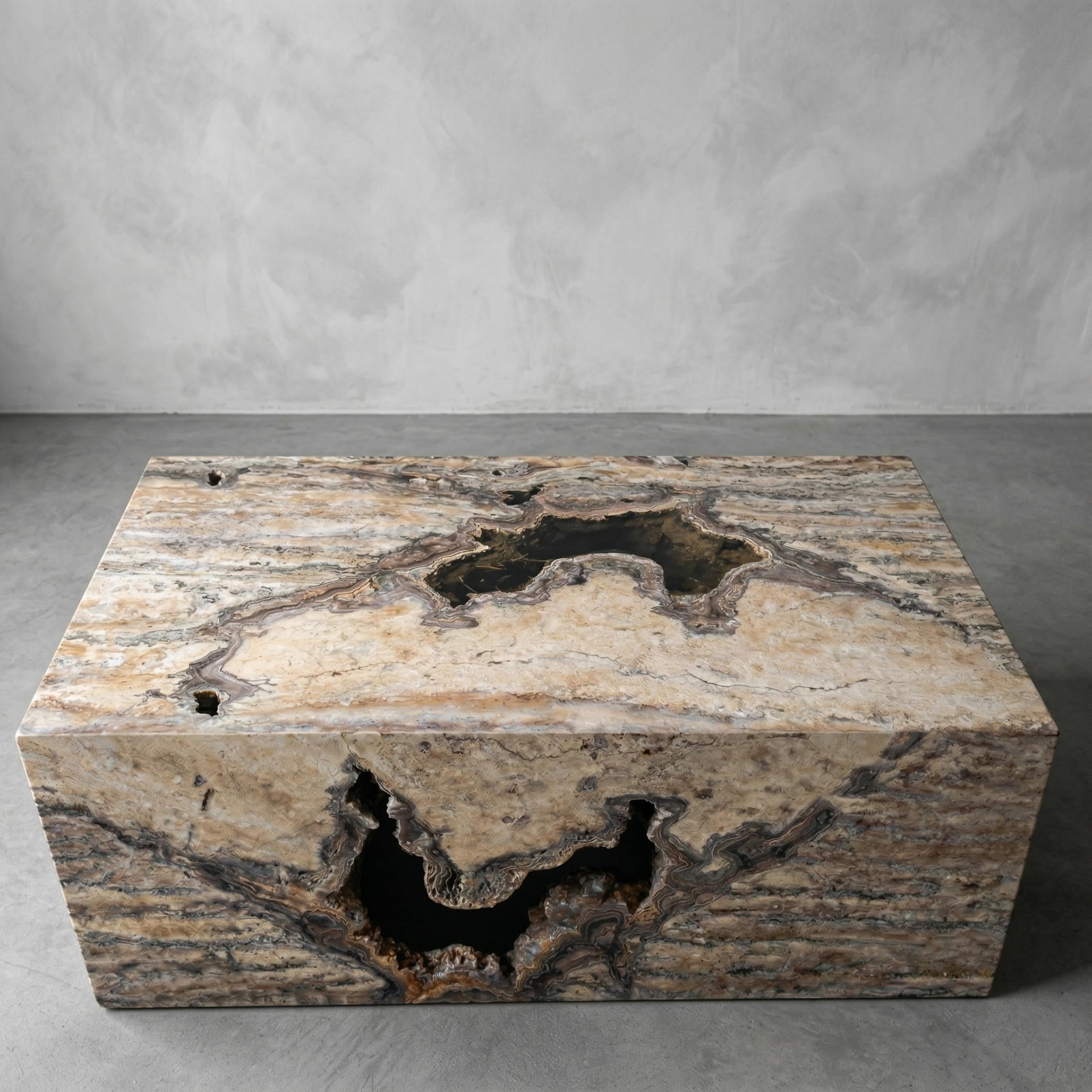 https://a.1stdibscdn.com/pitted-silver-travertine-coffee-table-unfilled-silver-travertine-center-table-for-sale-picture-4/f_91932/f_494881721775123791594/silver_traverten_coffee_table_7_jpg_master.jpeg