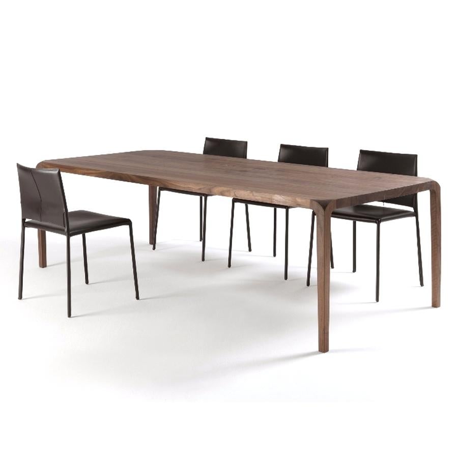 https://a.1stdibscdn.com/sleek-wood-dining-table-designed-by-karim-rashid-made-in-italy-for-sale-picture-4/f_49571/f_188230521587679468101/sleek_5_master.jpg