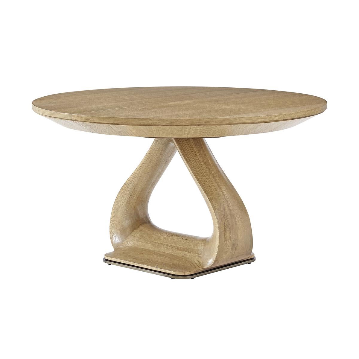 https://a.1stdibscdn.com/organic-modern-round-oak-extending-dining-table-for-sale-picture-2/f_8038/f_395997321715039487645/table2_master.jpg