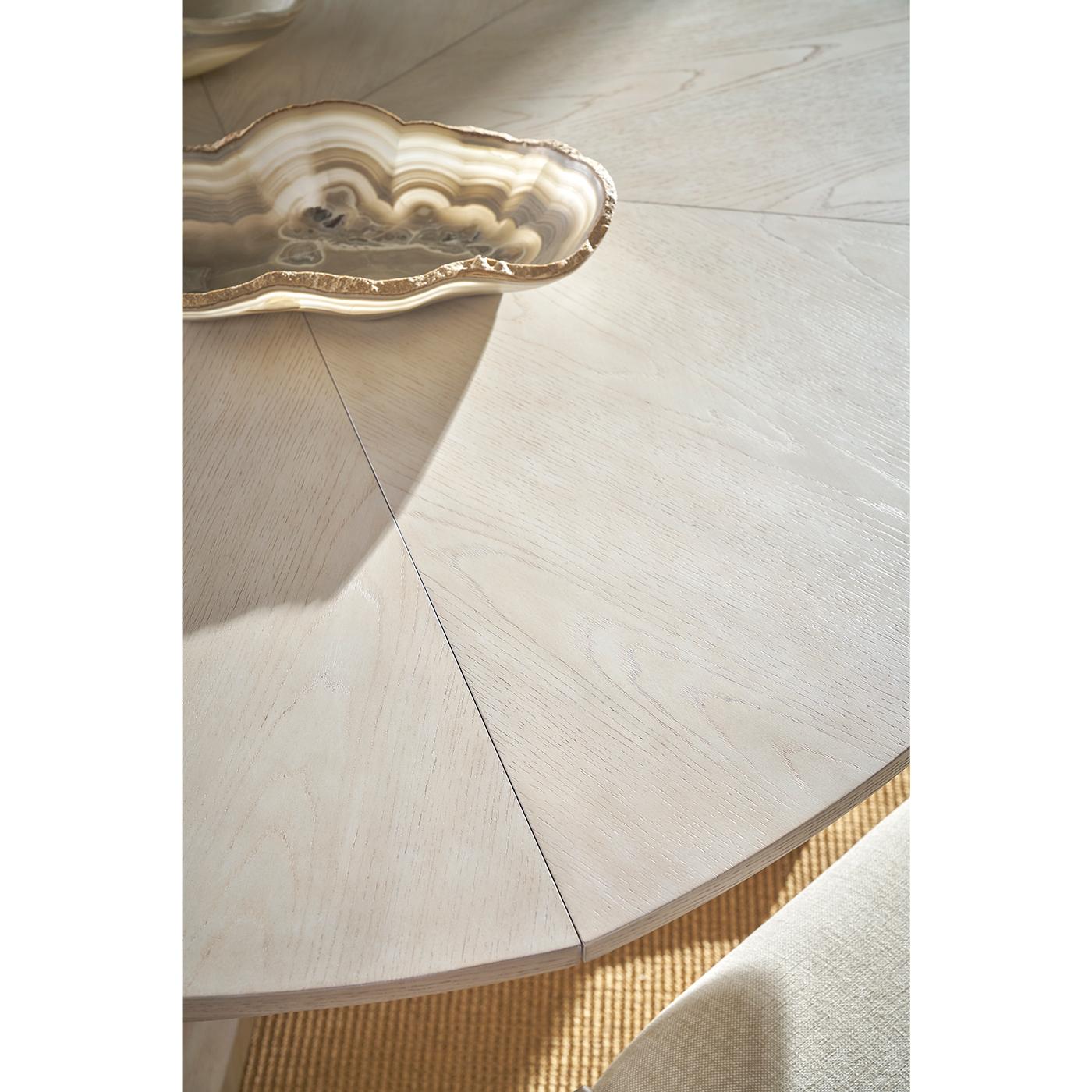 https://a.1stdibscdn.com/round-white-coastal-extension-dining-table-for-sale-picture-5/f_8038/f_444469521744230560949/table_2_master.jpg