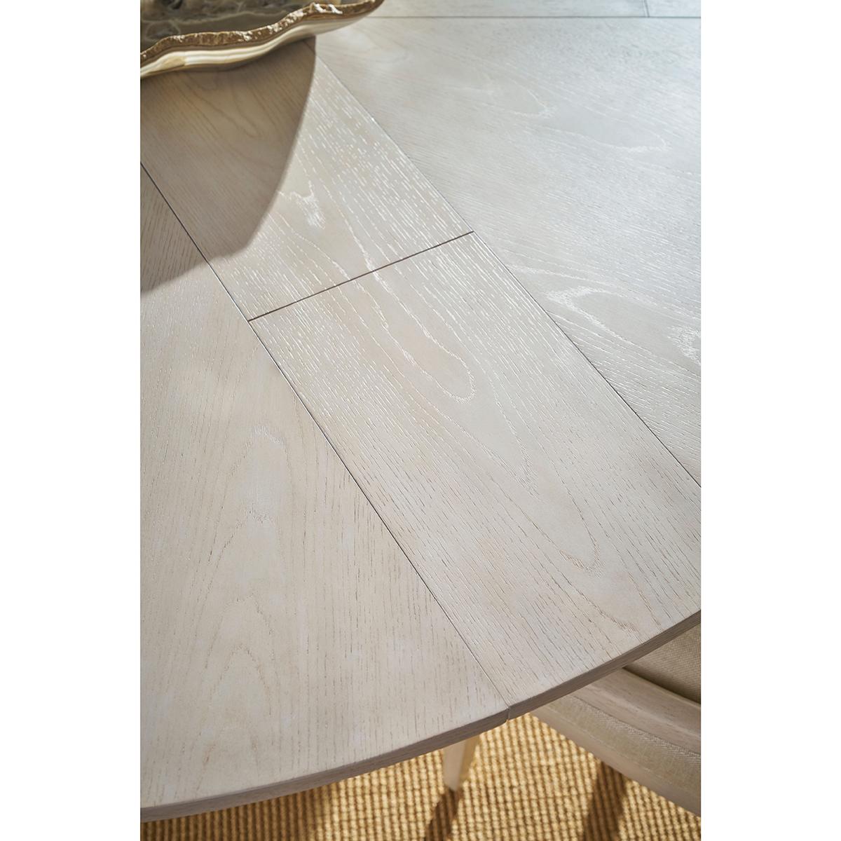 https://a.1stdibscdn.com/round-white-coastal-extension-dining-table-for-sale-picture-7/f_8038/f_444469521744230560476/table_8_master.jpg