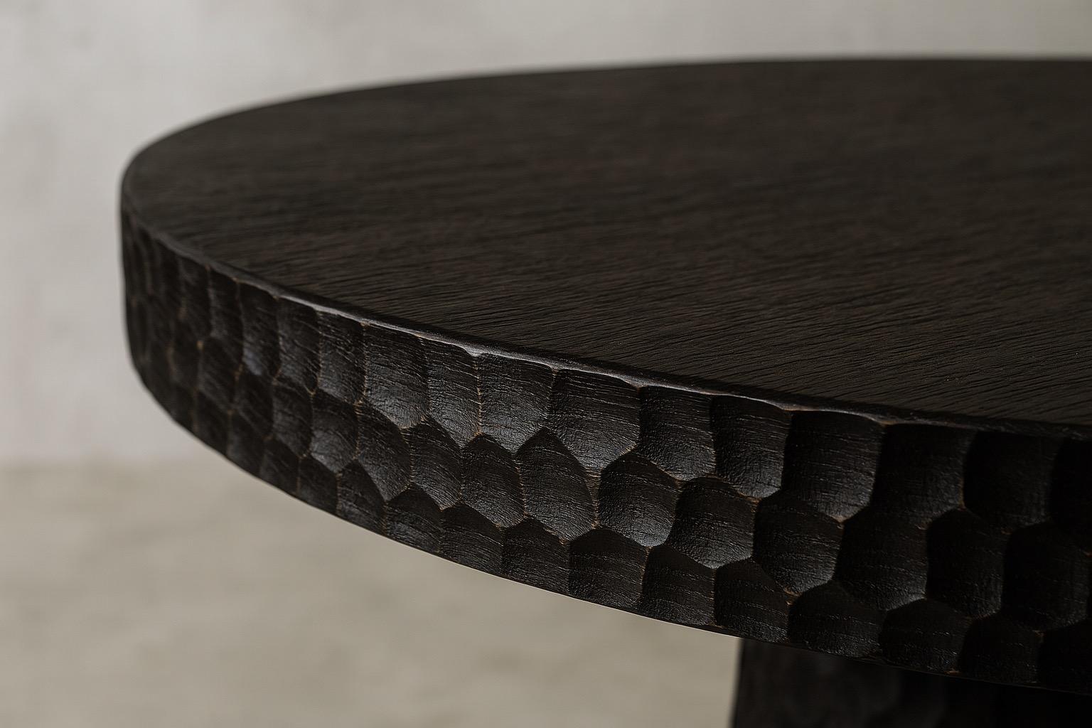 https://a.1stdibscdn.com/round-solid-oak-dining-table-with-hand-carved-texture-in-black-by-sergio-vulpe-for-sale-picture-3/f_99712/f_470344121760401289632/tempImageCaxixY_master.jpg