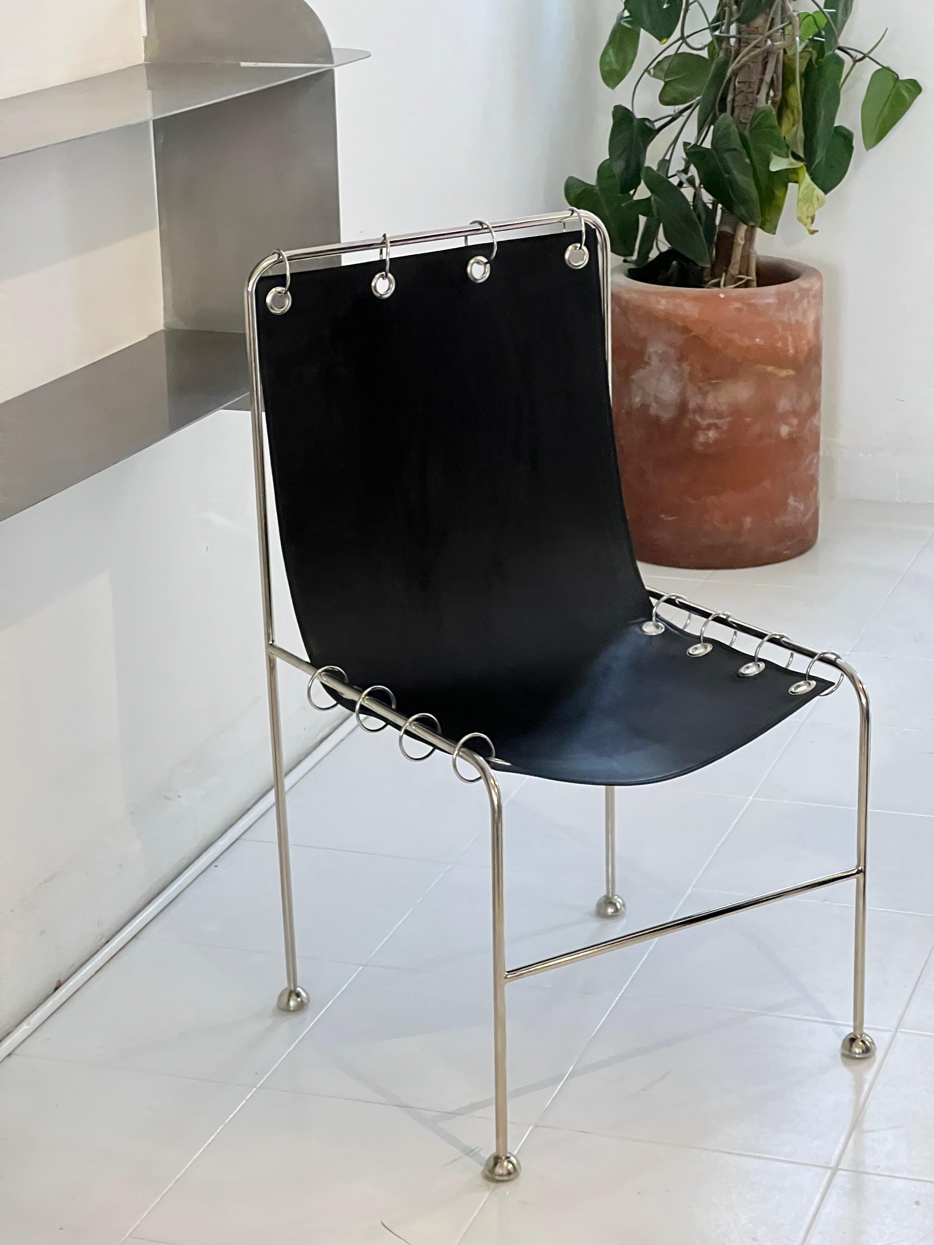 https://a.1stdibscdn.com/institution-sculptural-chair-black-leather-for-sale-picture-4/f_69682/f_49345832/tempImagehKg3xD_1774291609508_master.jpg