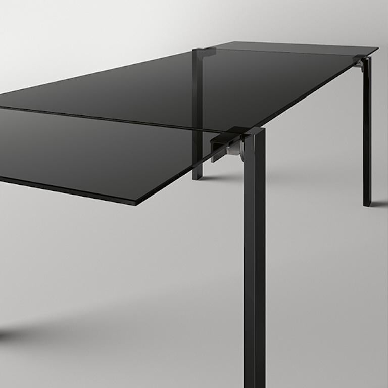https://a.1stdibscdn.com/livingstone-dark-extending-dining-table-designed-by-giulio-mancini-for-sale-picture-2/f_49571/f_364487421696377924811/tonelli_tavoli_alti_livingstone_dark_1_mob_master.jpg