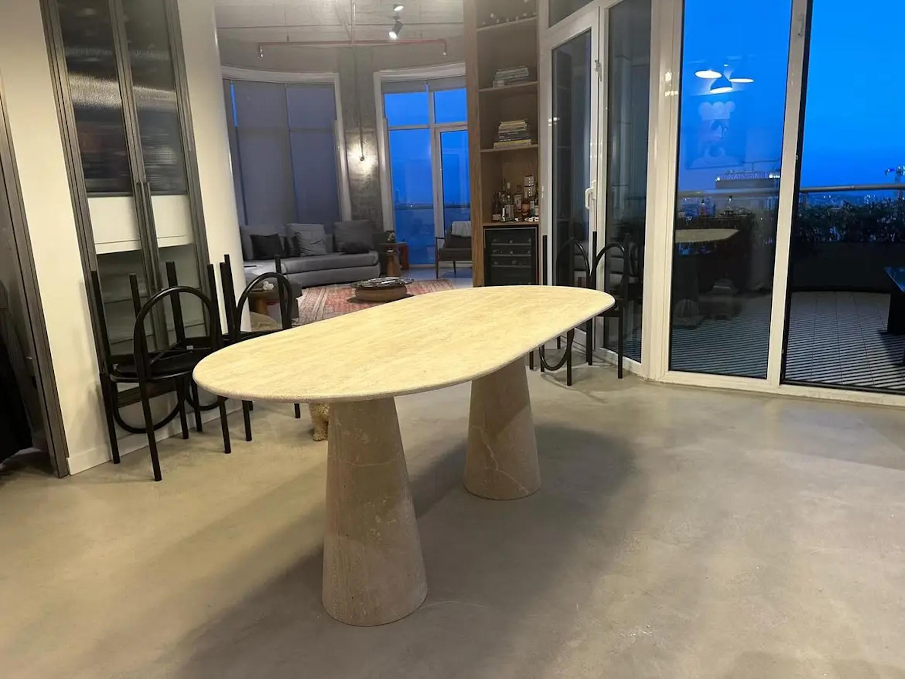 https://a.1stdibscdn.com/made-to-order-travertine-dining-table-with-conic-legs-by-tinella-wood-for-sale-picture-3/f_91932/f_430819821736420276395/travertine_dining_table_conic_leg_4_master.jpg