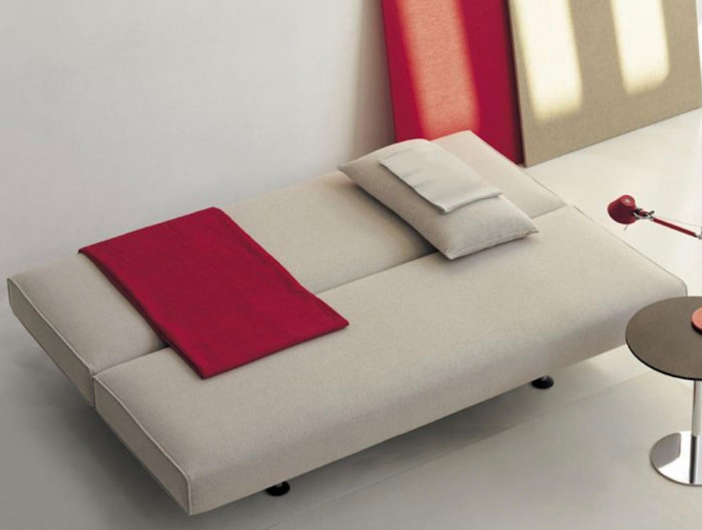 https://a.1stdibscdn.com/sliding-sofa-bed-by-pietro-arosio-for-tacchini-for-sale-picture-2/f_105752/f_464168321756201498604/tsliding_master.jpg