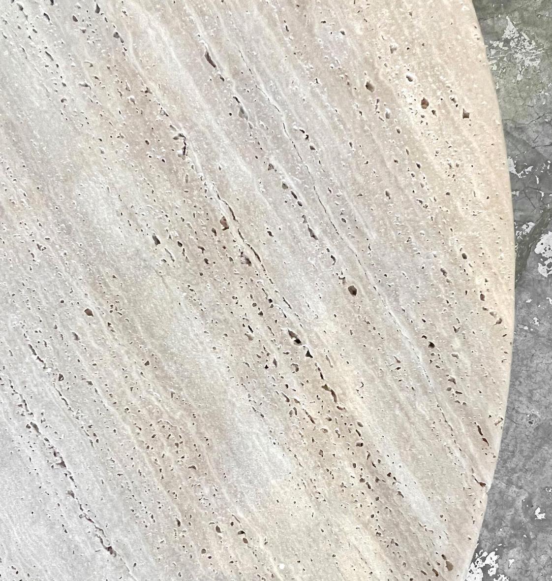 https://a.1stdibscdn.com/cream-travertine-round-dining-table-in-the-style-of-1970-angelo-mangiarotti-for-sale-picture-4/f_80522/f_326841021677441759519/unfilled_travertine_master.jpg