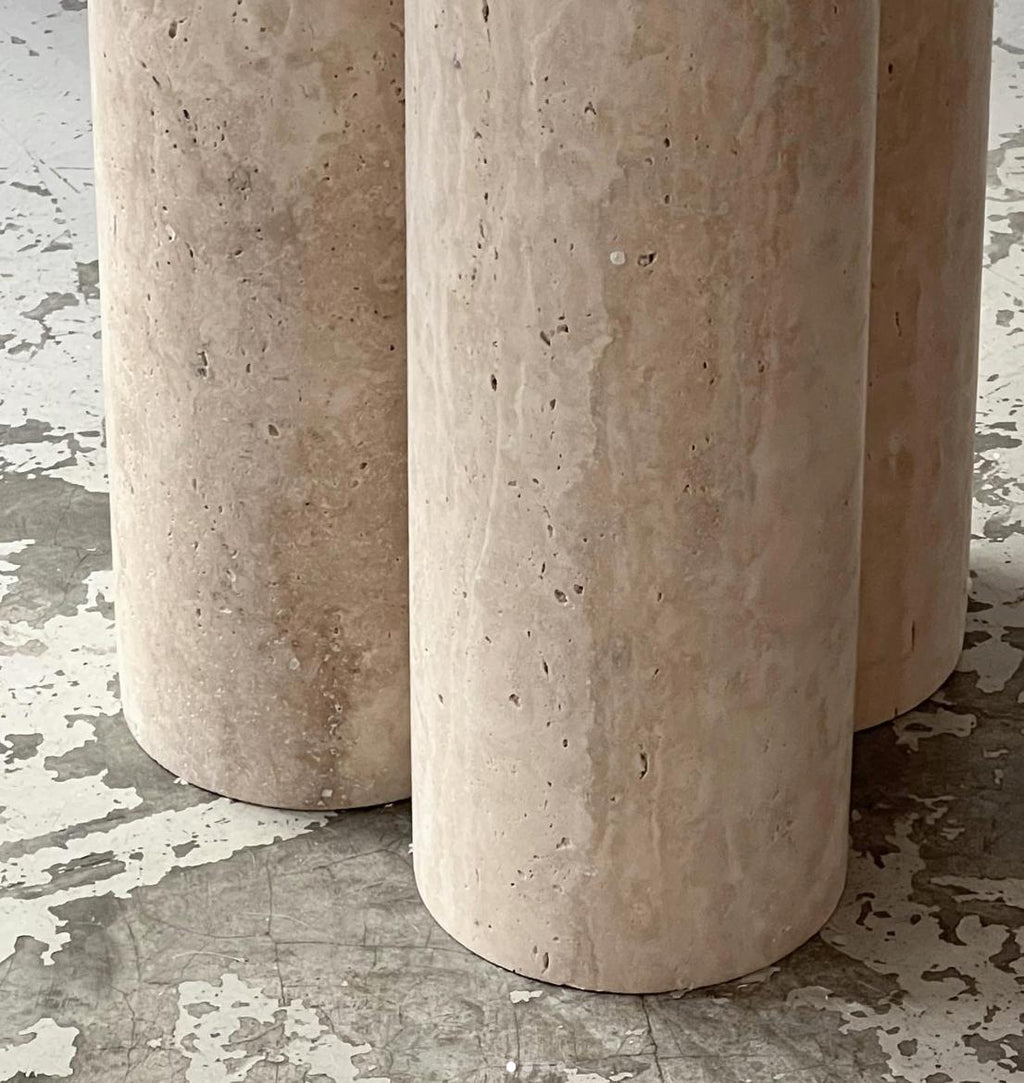 https://a.1stdibscdn.com/cream-travertine-round-dining-table-in-the-style-of-1970-mario-bellini-for-sale-picture-6/f_80522/f_326687621675963327427/unfilled_travertine_round_dining_closeup_legs_master.jpg