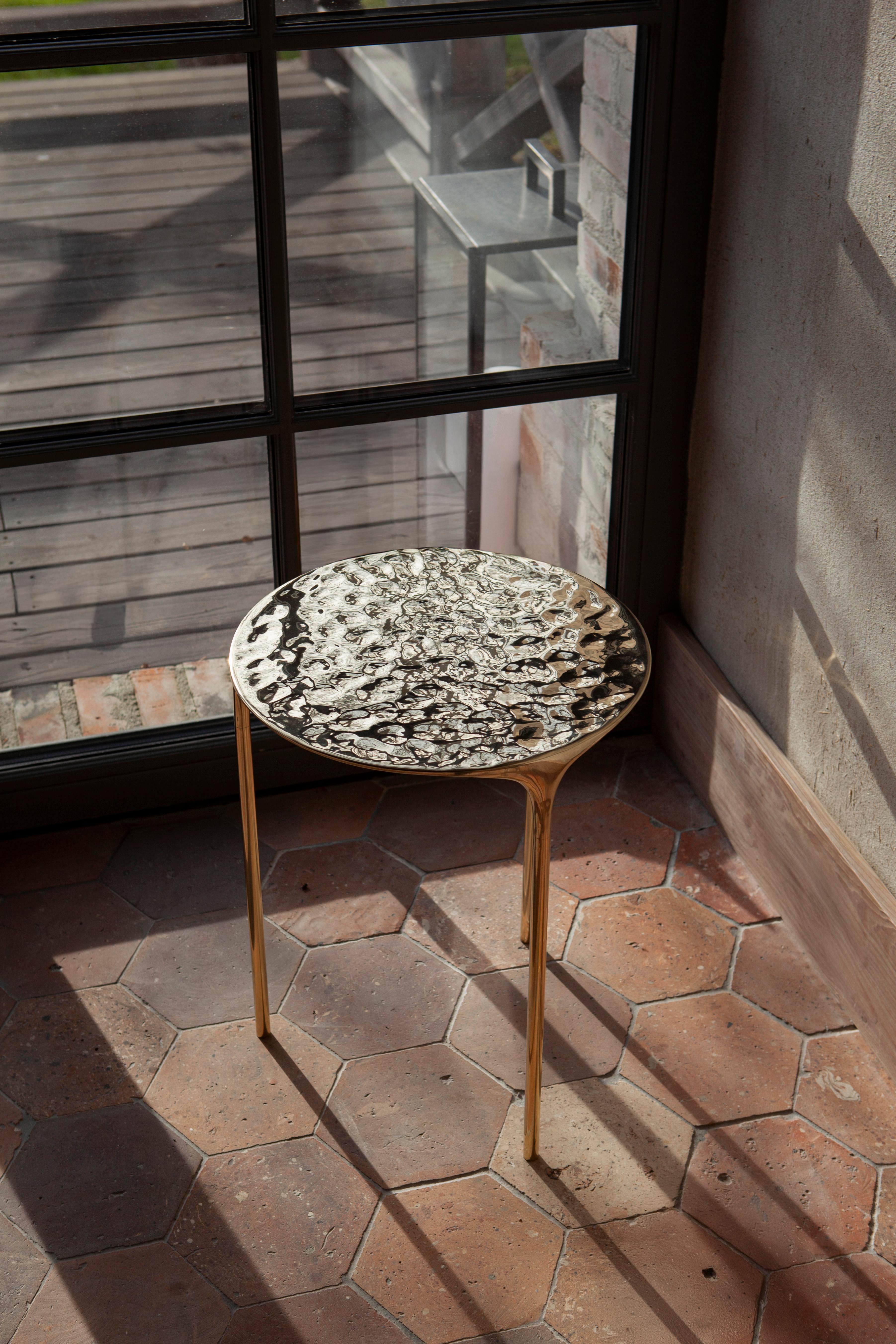 https://a.1stdibscdn.com/coffee-table-rippled-brass-for-sale-picture-3/f_98462/f_473546721762172434930/unism_fluid_coffee_table_rippled_brass_image_1_master.jpg