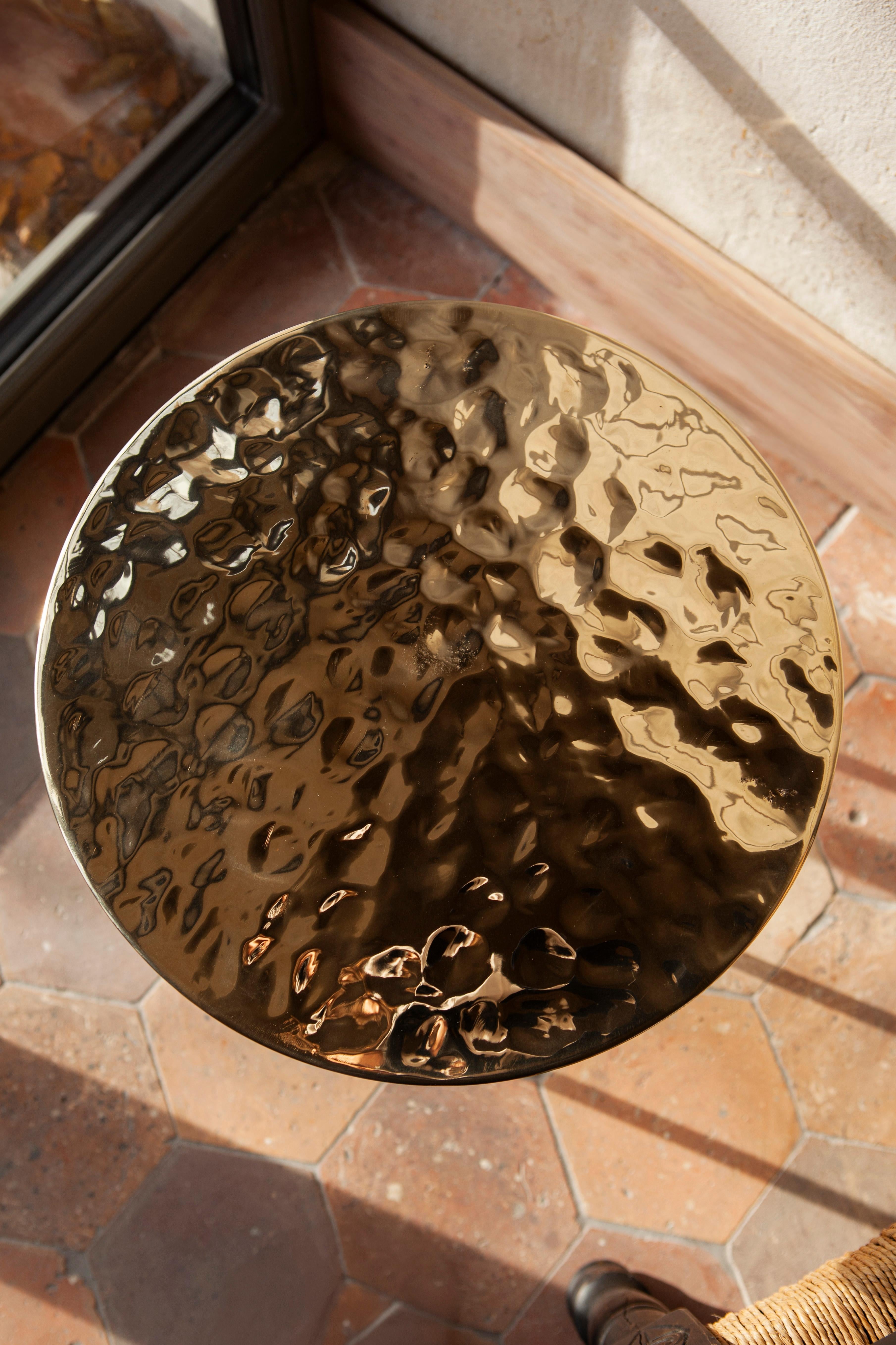 https://a.1stdibscdn.com/coffee-table-rippled-brass-for-sale-picture-5/f_98462/f_473546721762172434729/unism_fluid_coffee_table_rippled_brass_image_4_master.jpg