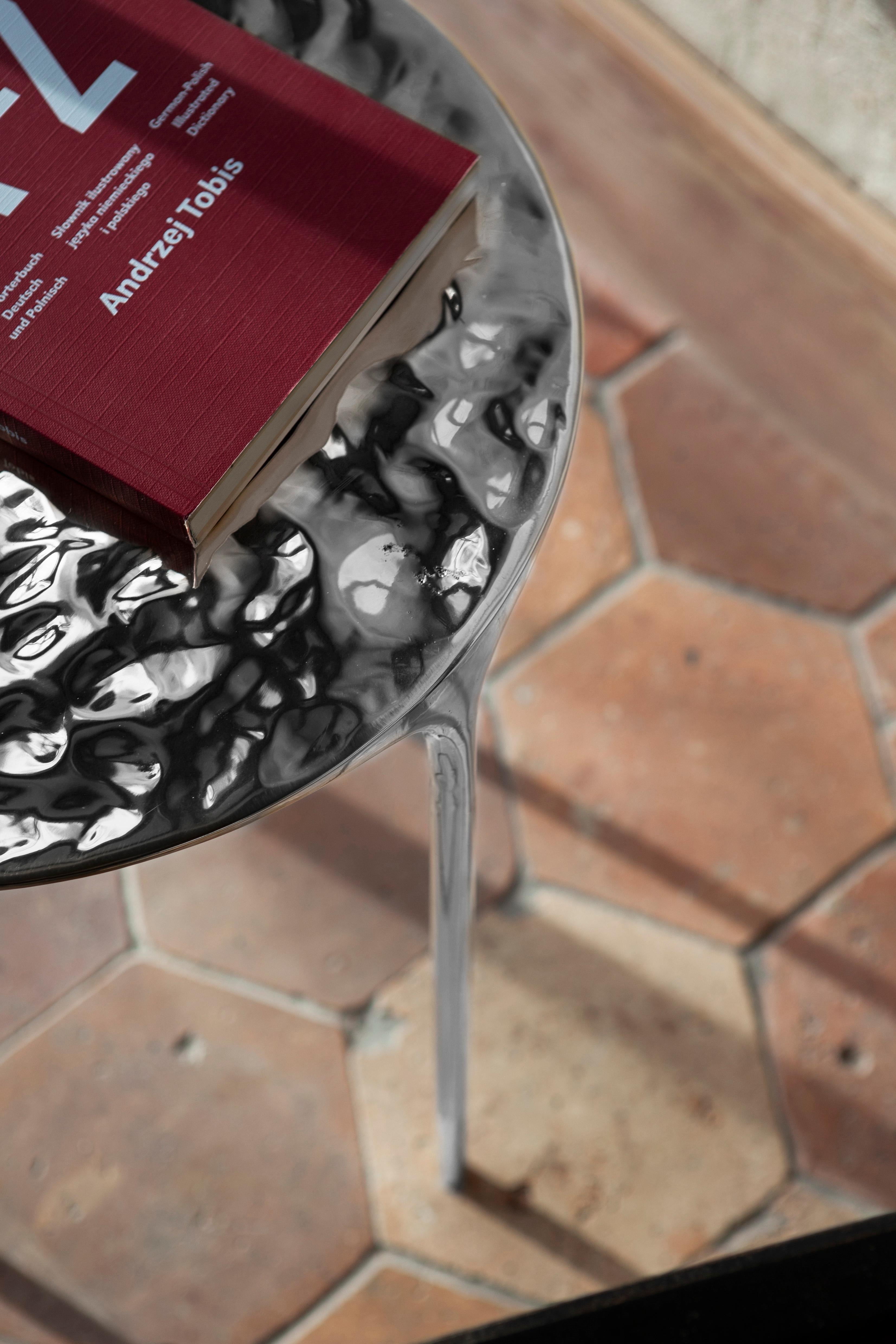 https://a.1stdibscdn.com/coffee-table-handmade-sandcasted-metal-in-rippled-aluminium-by-unism-for-sale-picture-5/f_98462/f_475250021763134914486/unism_fluid_coffee_table_rippled_brass_image_7_master.jpg