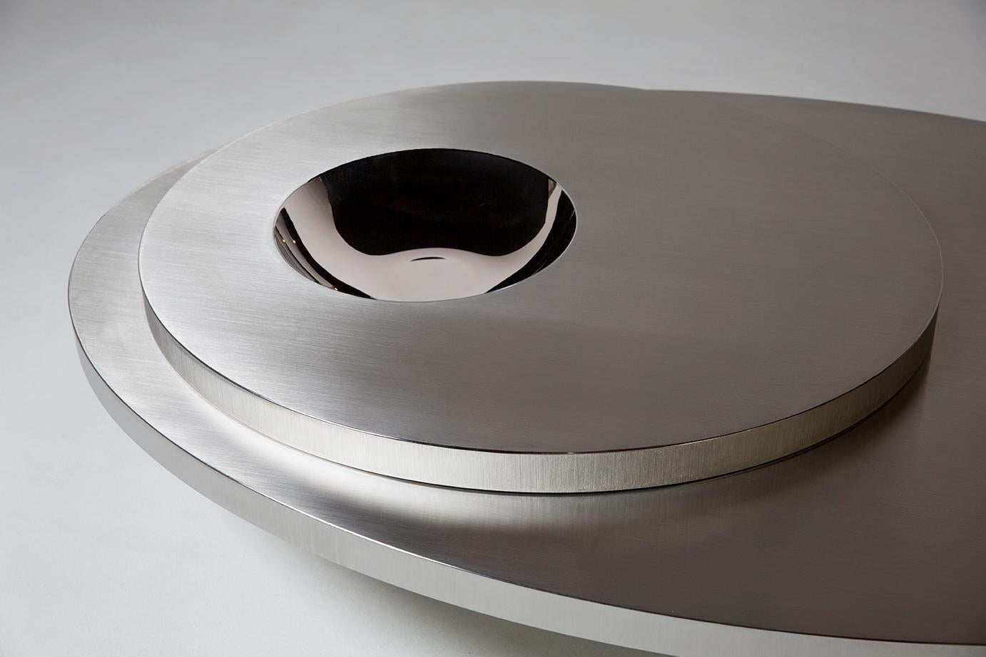 https://a.1stdibscdn.com/contemporary-futuristic-center-table-in-stainless-steel-for-sale-picture-2/f_39861/f_118309731535038303580/vasconcellosbarreto_stills_152_Recovered_master.jpg