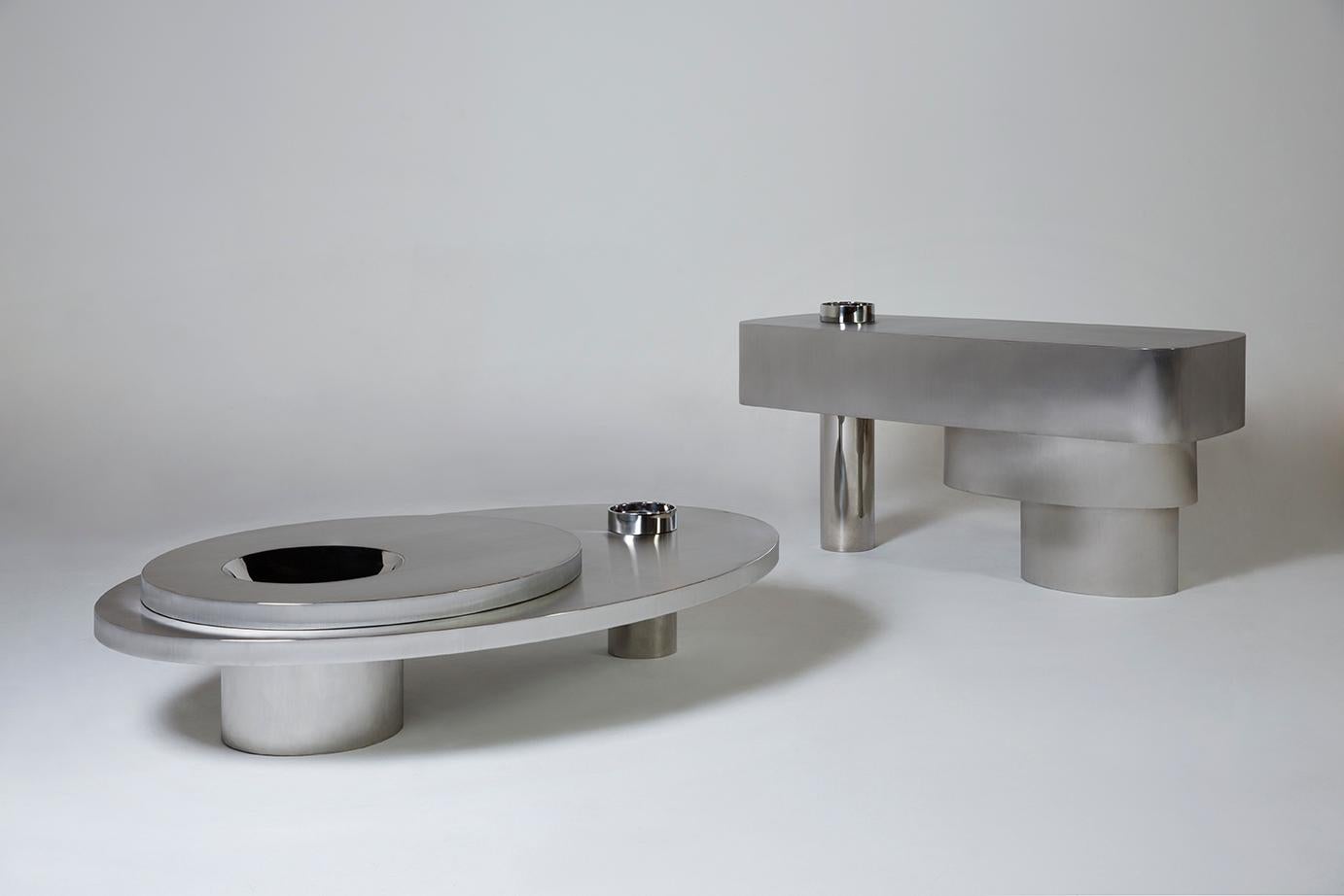 https://a.1stdibscdn.com/contemporary-futuristic-center-table-in-stainless-steel-for-sale-picture-3/f_39861/f_118309731535038333487/vasconcellosbarreto_stills_182_master.jpg