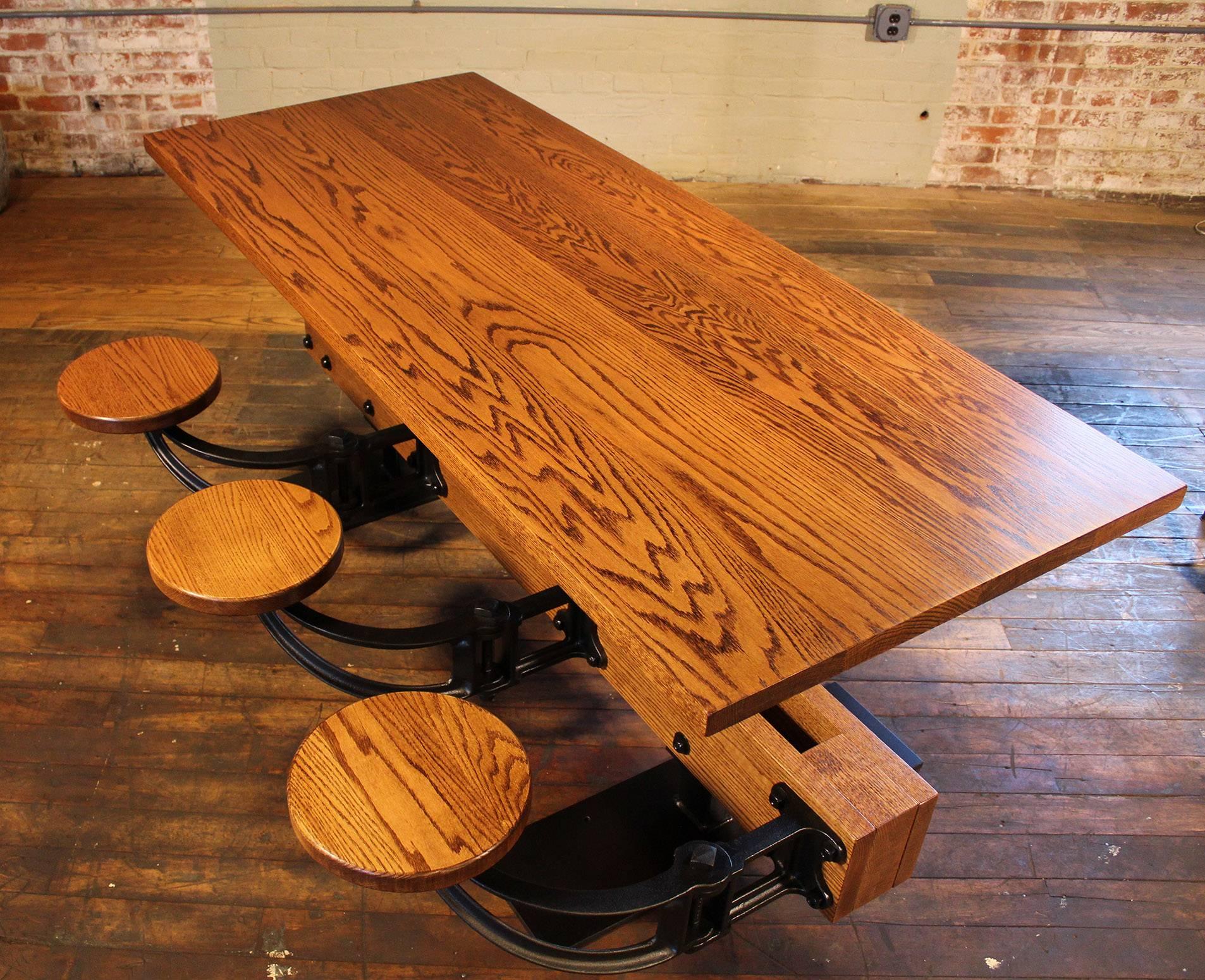 https://a.1stdibscdn.com/oak-dining-table-with-attached-swing-out-seats-for-sale-picture-4/f_8299/f_138565011551456570892/vintage_oak_dining_table_with_built_in_attached_swing_out_seats_2_master.jpg