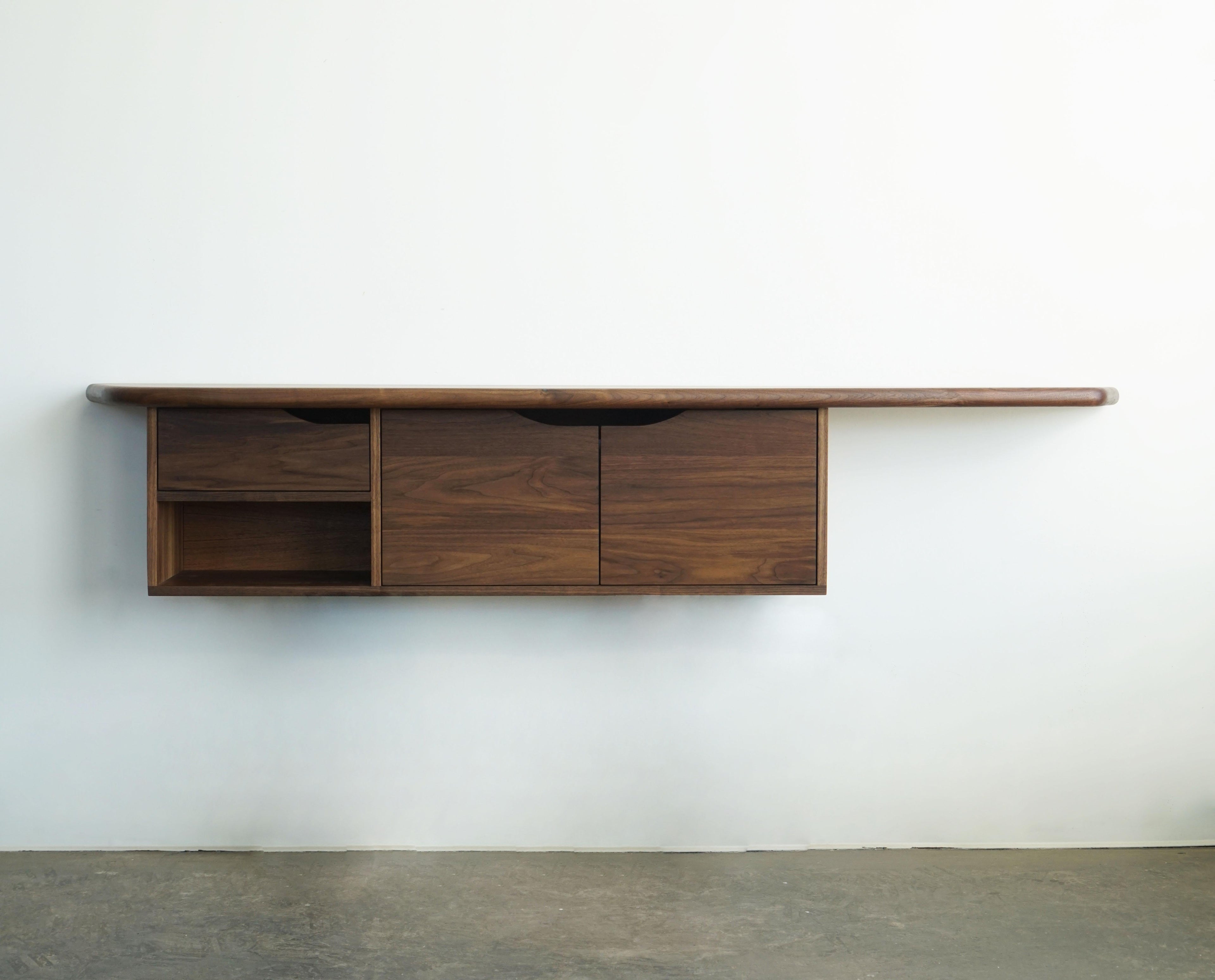 https://a.1stdibscdn.com/organic-shaped-modern-hanging-wall-unit-cabinet-by-last-workshop-walnut-for-sale-picture-4/f_73622/f_376999521703530942386/wall_unit_8_master.jpg